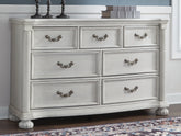 A2Z Furniture - Ashley Furniture - Montelaine Bedroom - Queen Upholstered Panel Bed / Antique White - B795B2