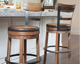 A2Z Furniture - Ashley Furniture - Pinnadel Dining Room - Bar Height Bar Stool (Set of 2) / Grayish Brown - D542-130X2