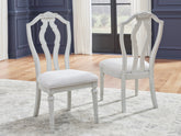 A2Z Furniture - Ashley Furniture - Montelaine Dining Room - Dining Chair (Set of 2) / Antique White - D795-01X2