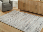 A2Z Furniture - Ashley Furniture - Nace Rug - 5' x 7' Area Rug / Gray/Brown/White - R407472