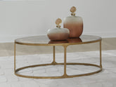 A2Z Furniture - Ashley Furniture - Korajane Coffee Table - Oval Cocktail Table / Antique Gold - T399-0