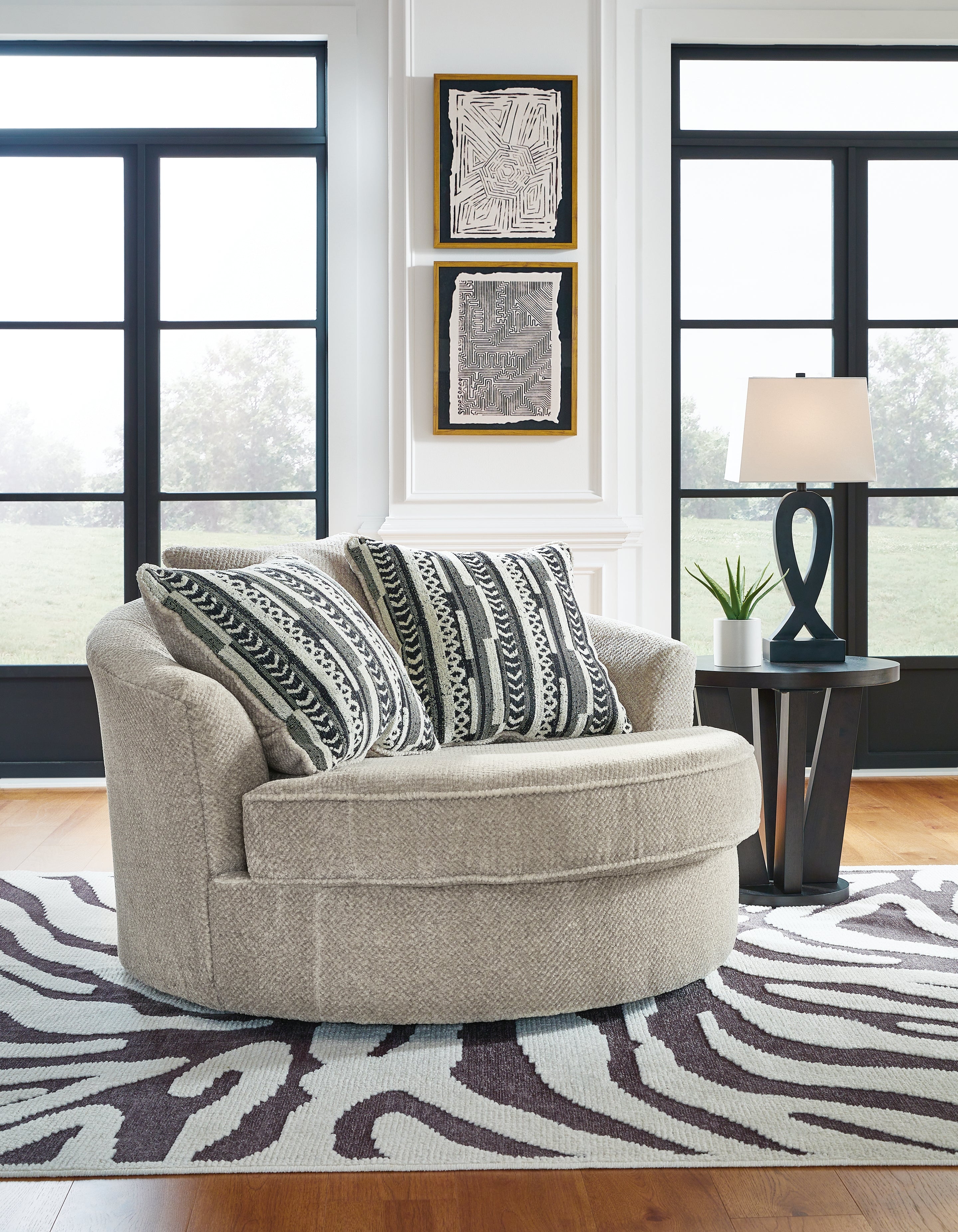 A2Z Furniture - Ashley Furniture - Calnita Living Room - Oversized Swivel Accent Chair / Sisal - 2050221