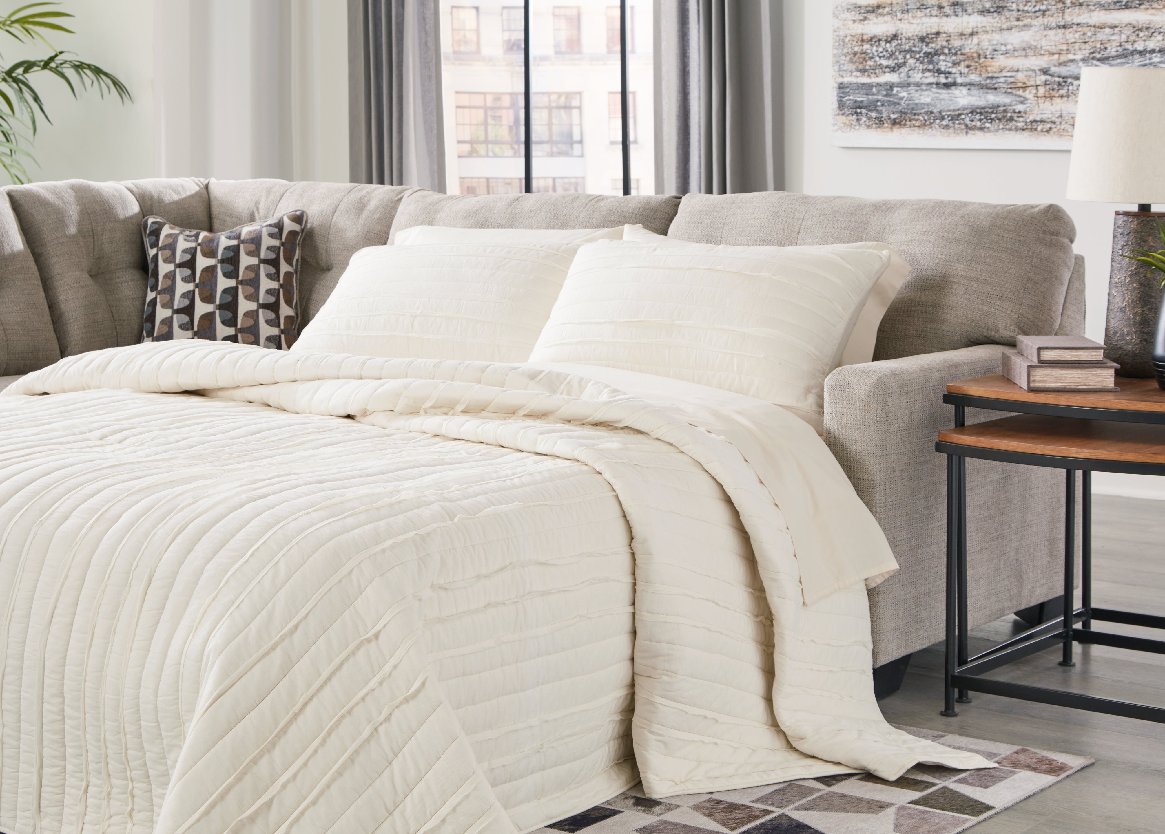 A2Z Furniture - Ashley Furniture - Mahoney Sectional - RAF 2-Piece Sleeper Sectional with Chaise / Pebble - 31004S3