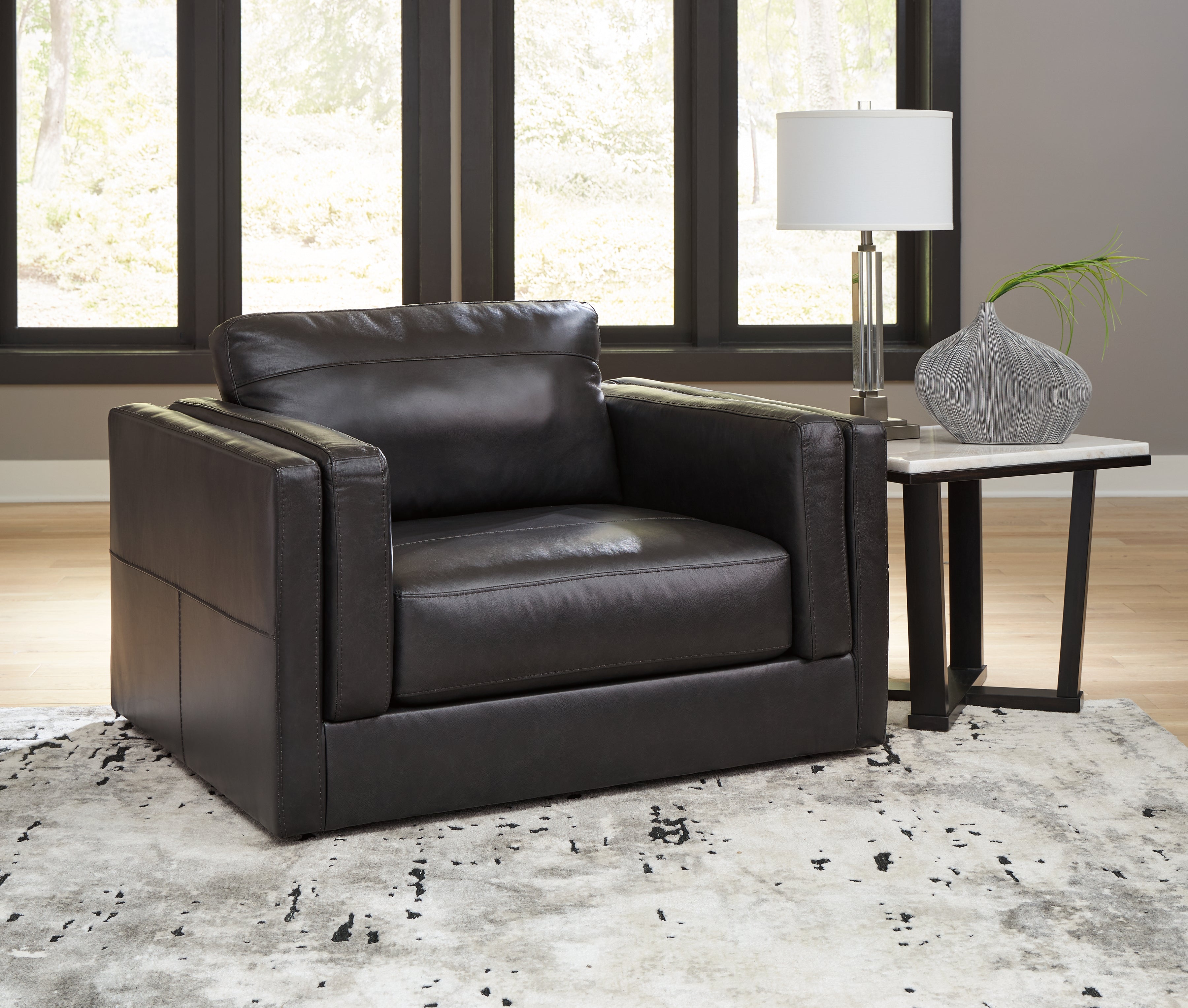 A2Z Furniture - Ashley Furniture - Amiata Living Room - Chair and a Half / Onyx - 5740523
