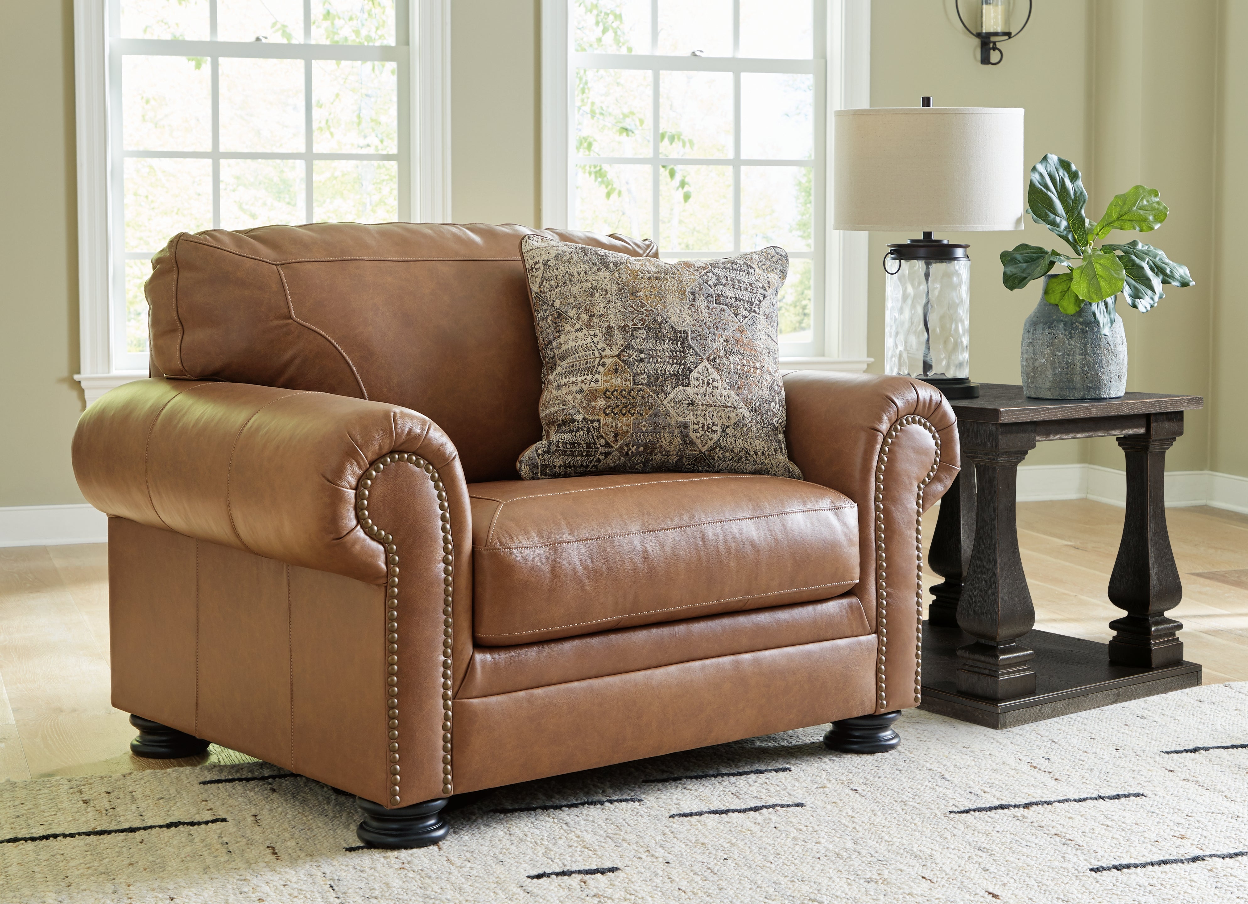 A2Z Furniture - Ashley Furniture - Carianna Living Room - Chair and a Half / Caramel - 5760423