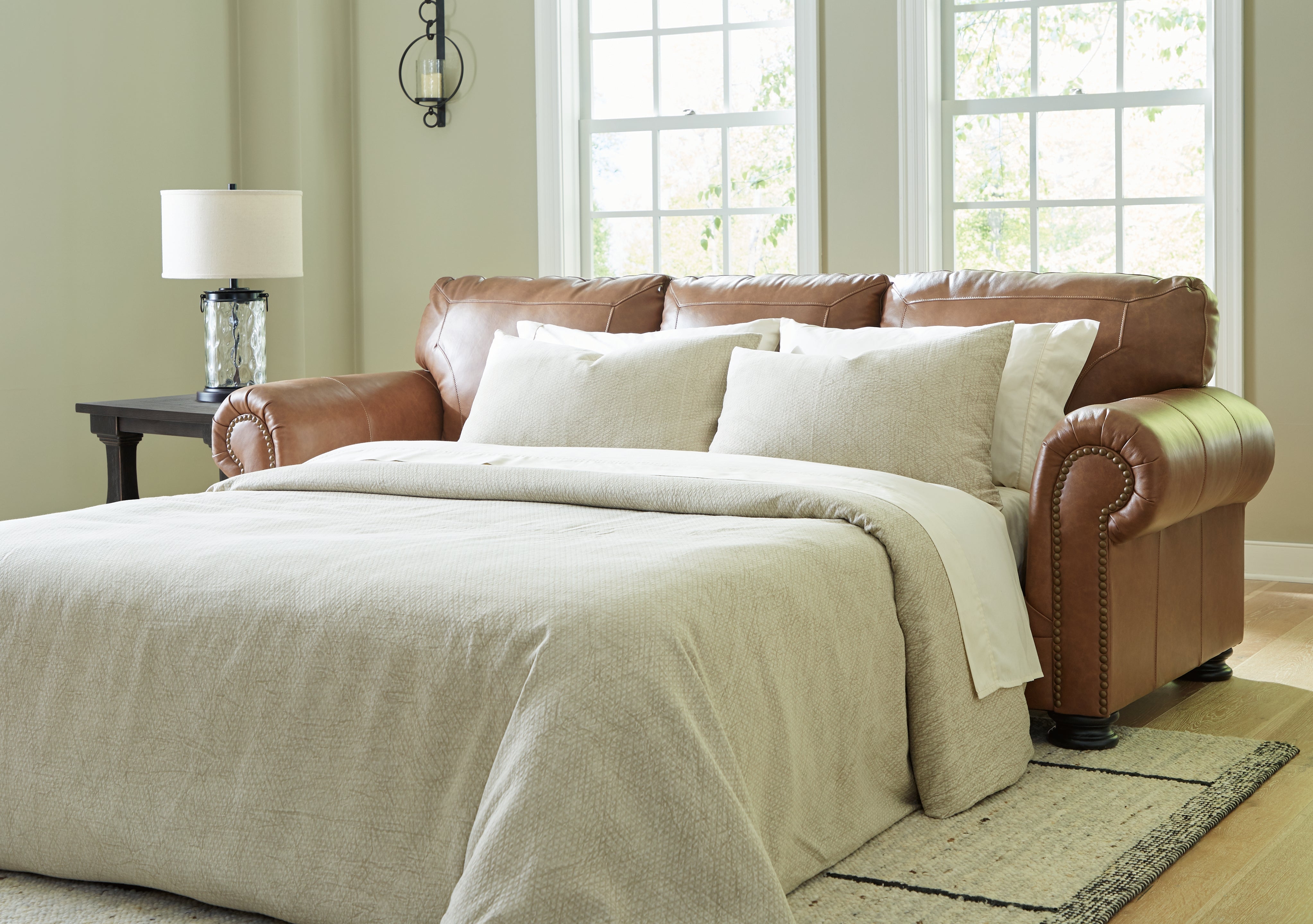 A2Z Furniture - Ashley Furniture - Carianna Living Room - Queen Sofa Sleeper / Caramel - 5760439
