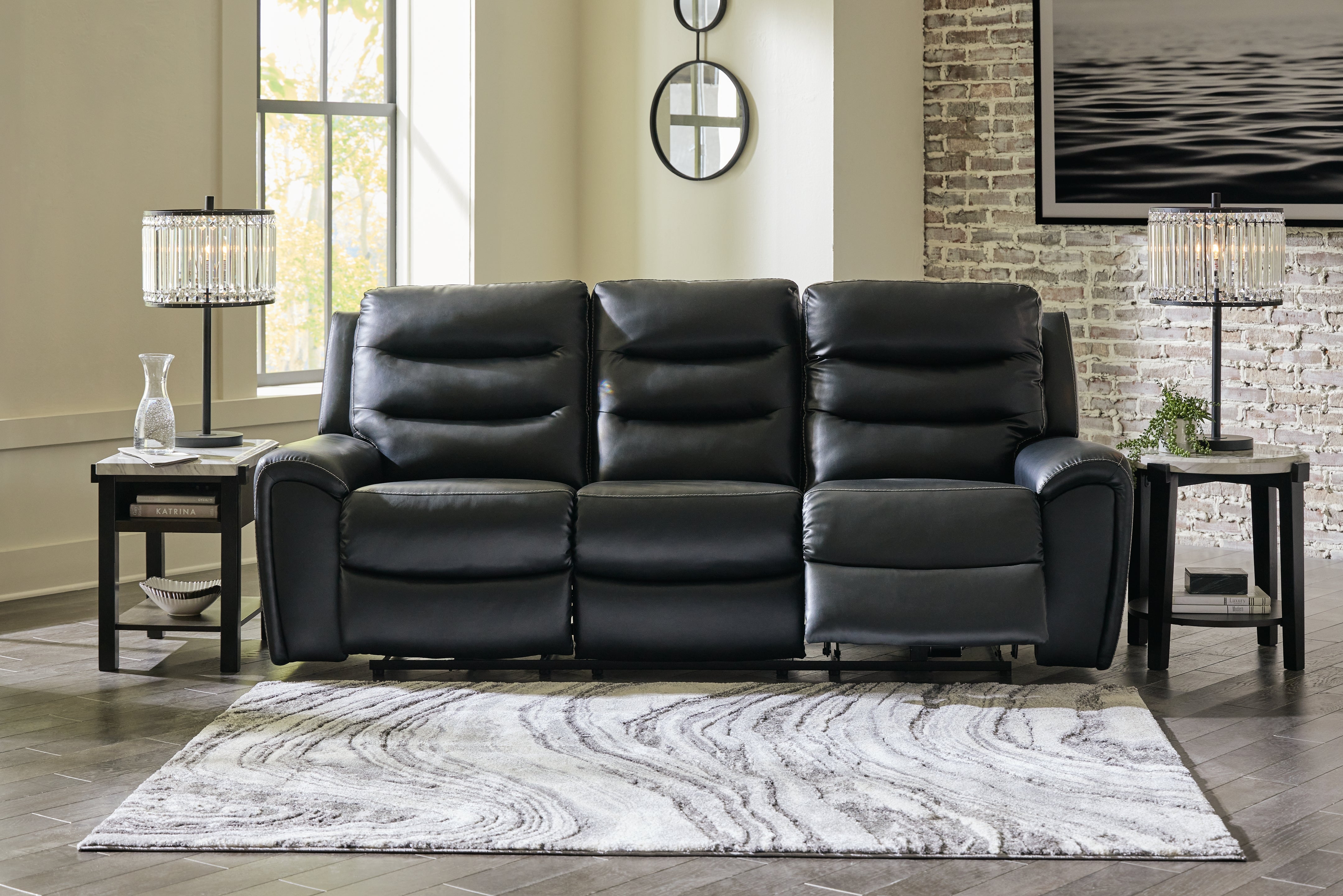 A2Z Furniture - Ashley Furniture - Warlin Living Room - PWR REC Sofa with ADJ Headrest / Black - 6110515