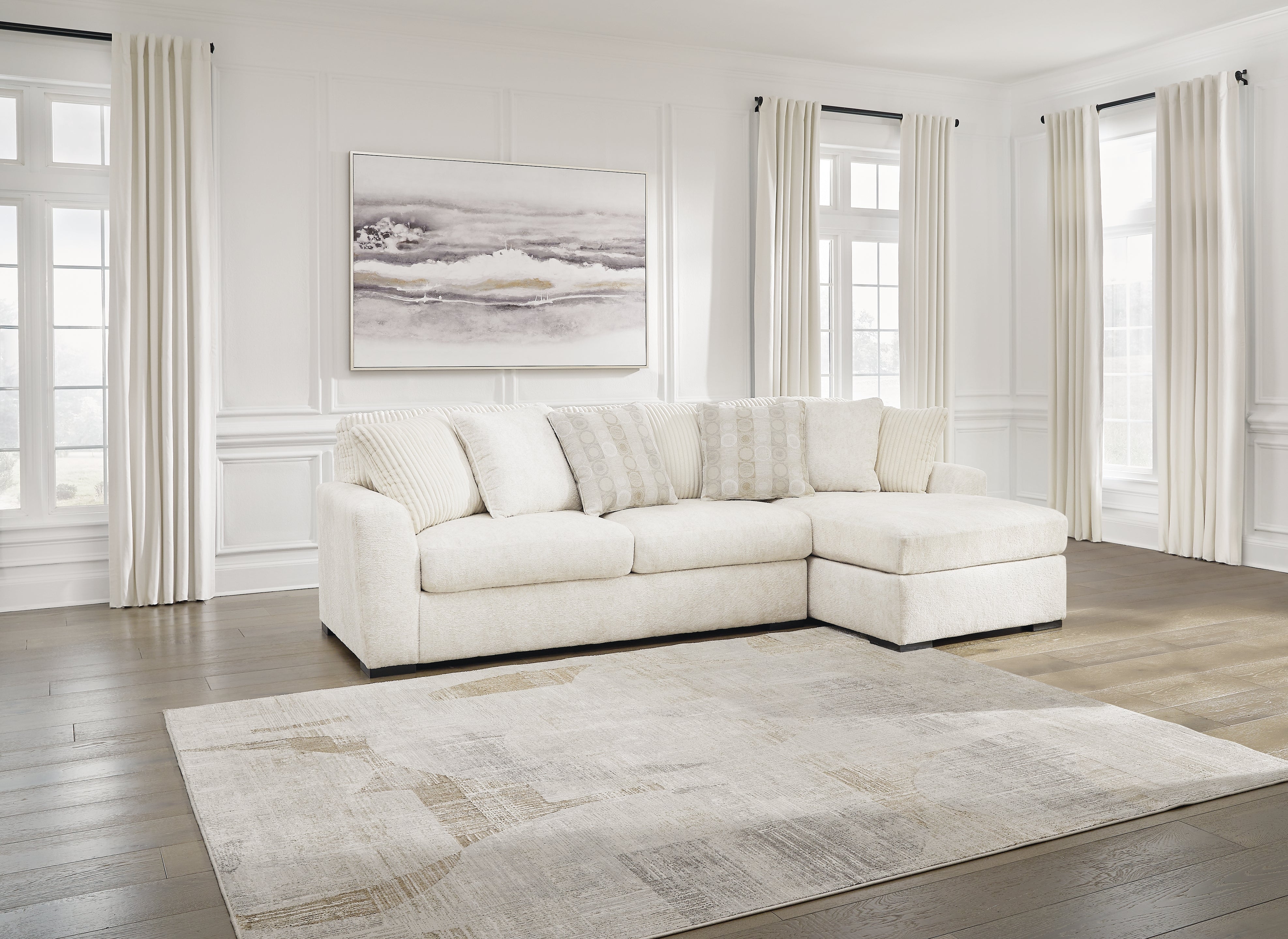 A2Z Furniture - Ashley Furniture - Chessington Sectional - LAF 2-Piece Sectional with Chaise / Ivory - 61904S2