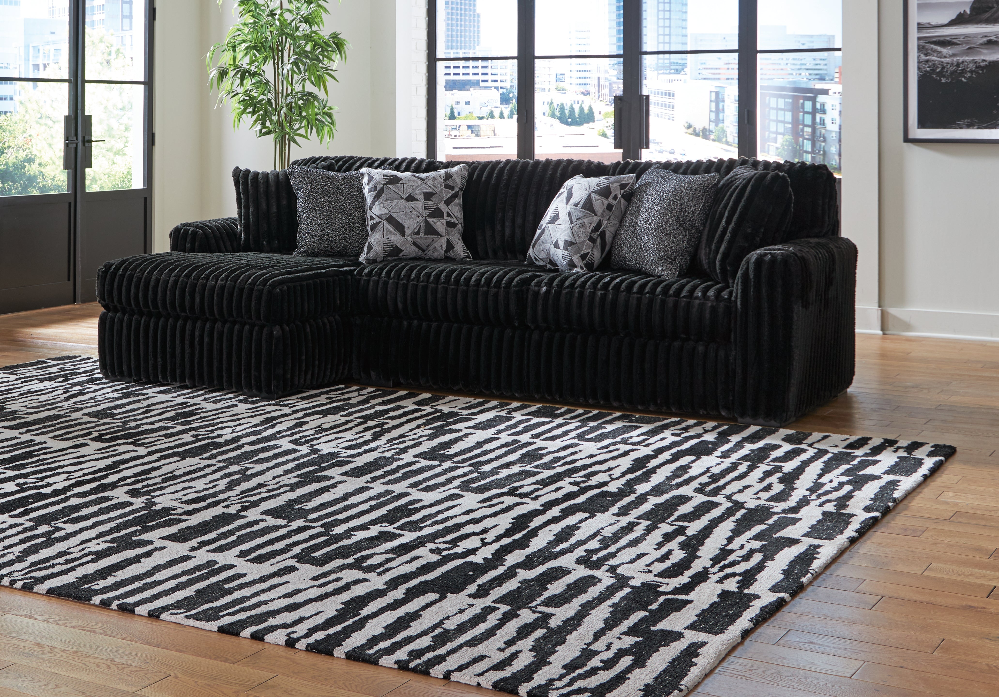 A2Z Furniture - Ashley Furniture - Midnight-Madness Sectional - RAF 2-Piece Sectional Sofa with Chaise / Onyx - 98103S1