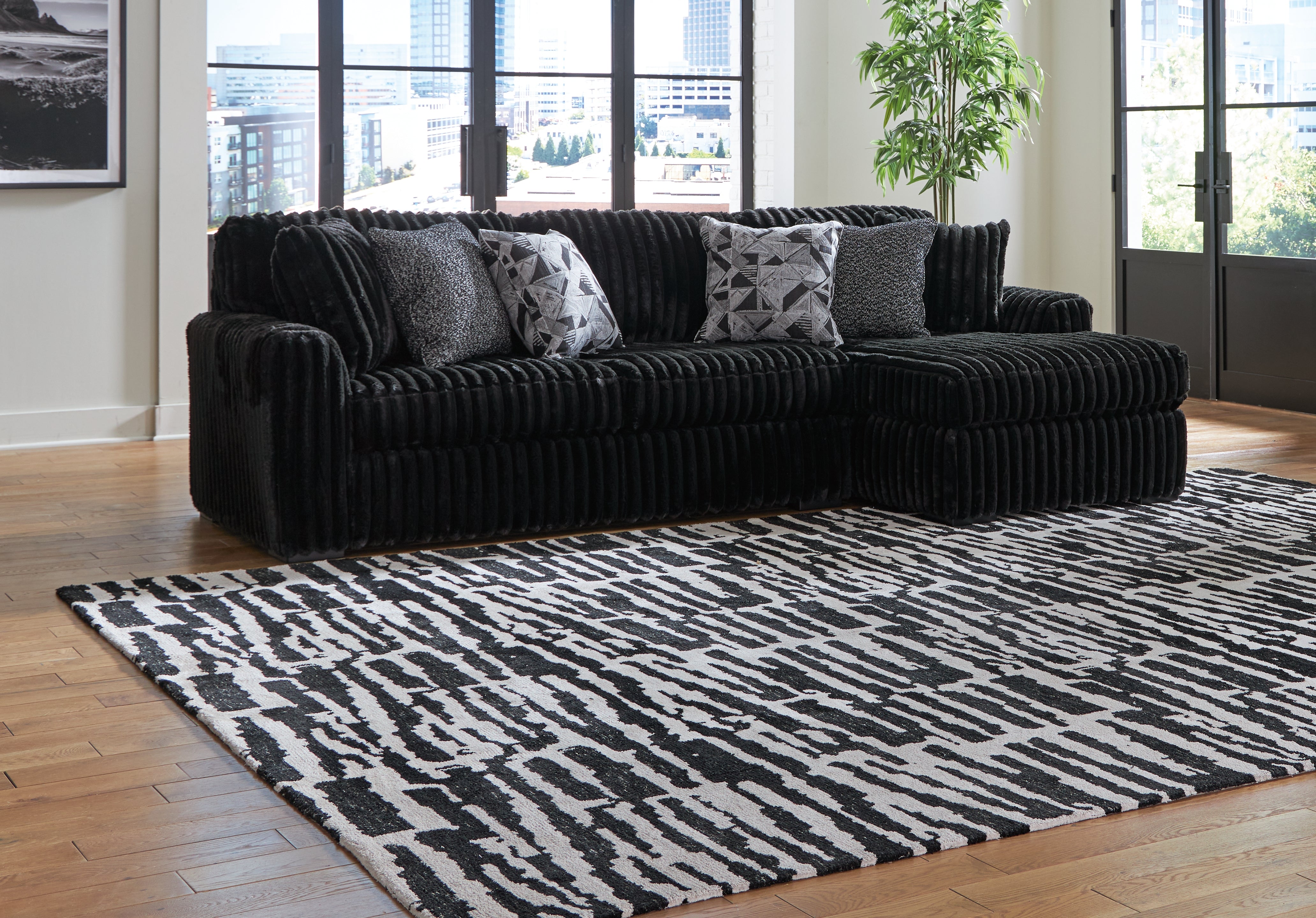 A2Z Furniture - Ashley Furniture - Midnight-Madness Sectional - LAF 2-Piece Sectional Sofa with Chaise / Onyx - 98103S2