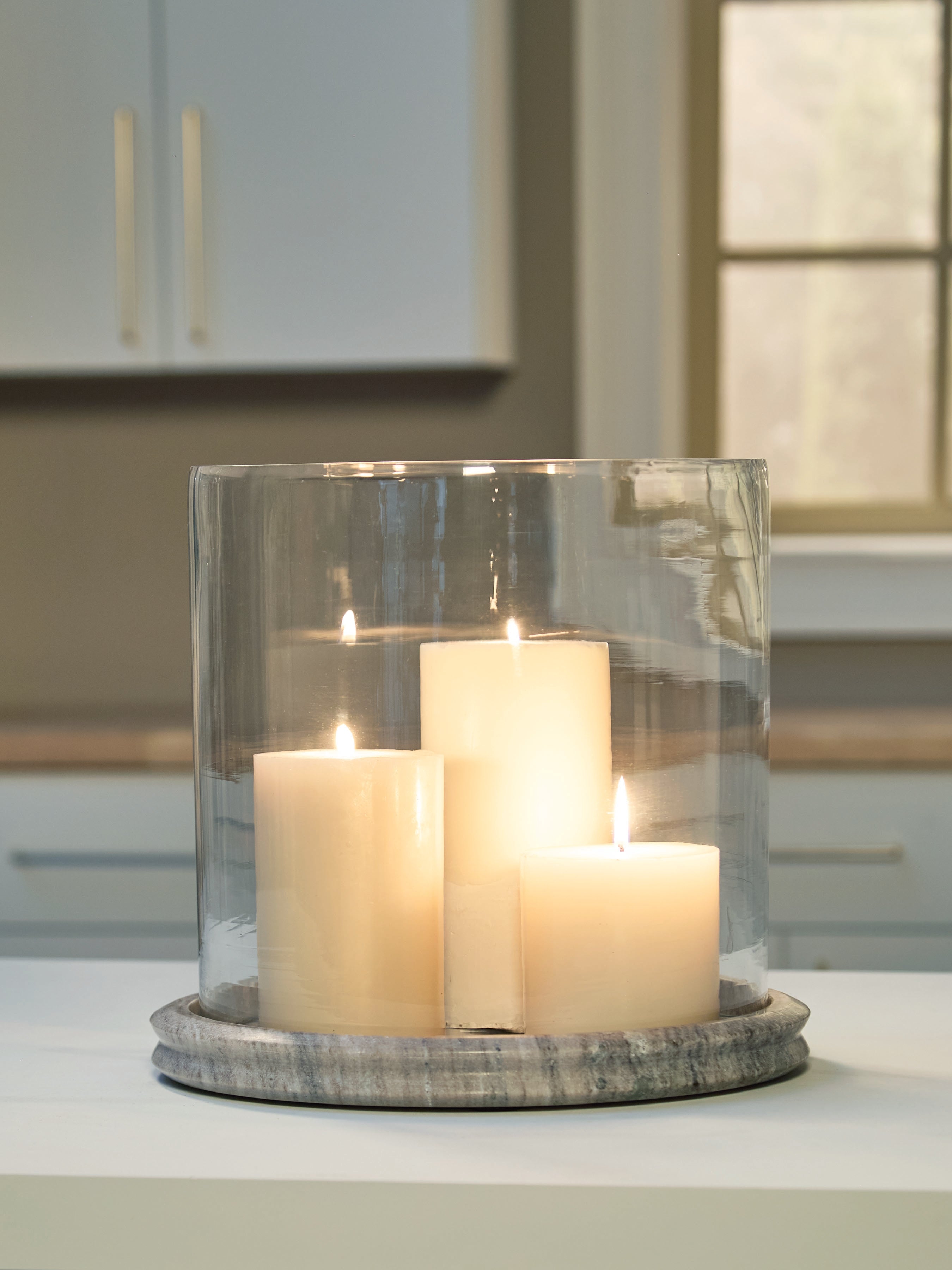 A2Z Furniture - Ashley Furniture - Saskia Candle Holder - Candle Holder / Clear/Beige - A2000847