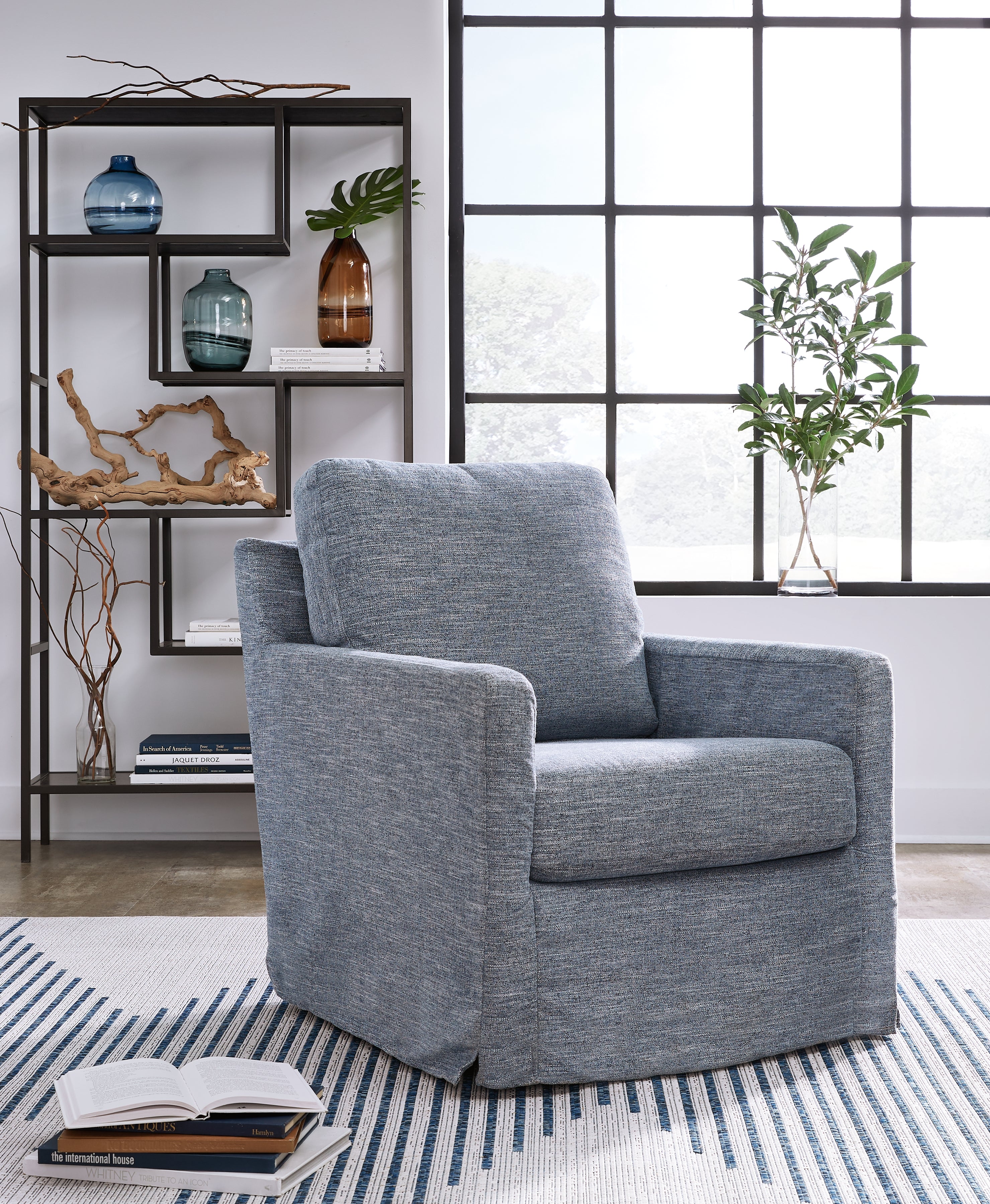 A2Z Furniture - Ashley Furniture - Nenana Next-Gen Nuvella Swivel Glider Accent Chair - Swivel Glider Accent Chair / Denim - A3000646