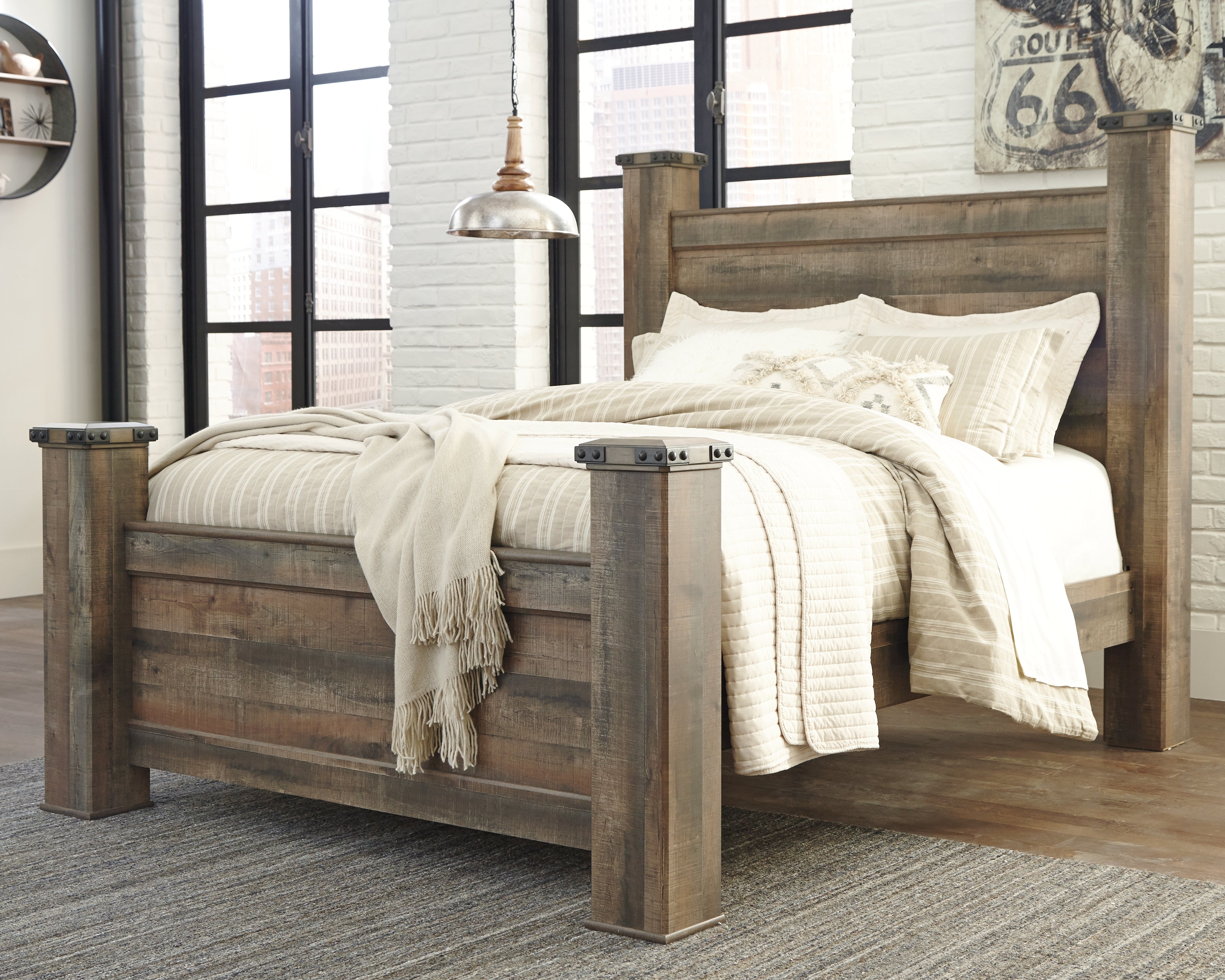 A2Z Furniture - Ashley Furniture - Trinell Bedroom - Queen Poster Bed / Brown - B446B40