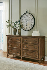 A2Z Furniture - Ashley Furniture - Sturlayne Bedroom - California King Upholstered Panel Bed / Brown - B787B5
