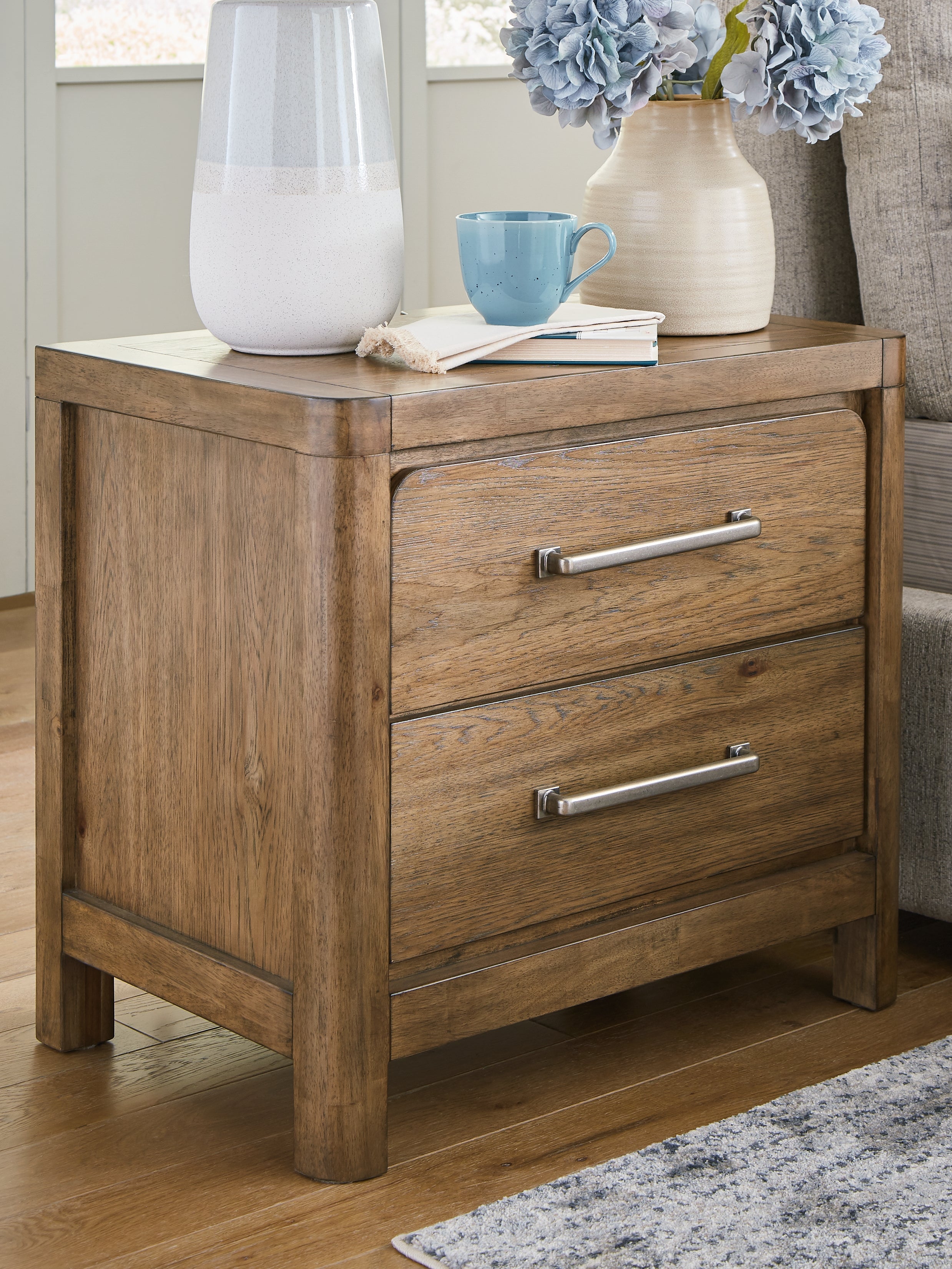 A2Z Furniture - Ashley Furniture - Cabalynn Bedroom - Two Drawer Night Stand / Light Brown - B974-92