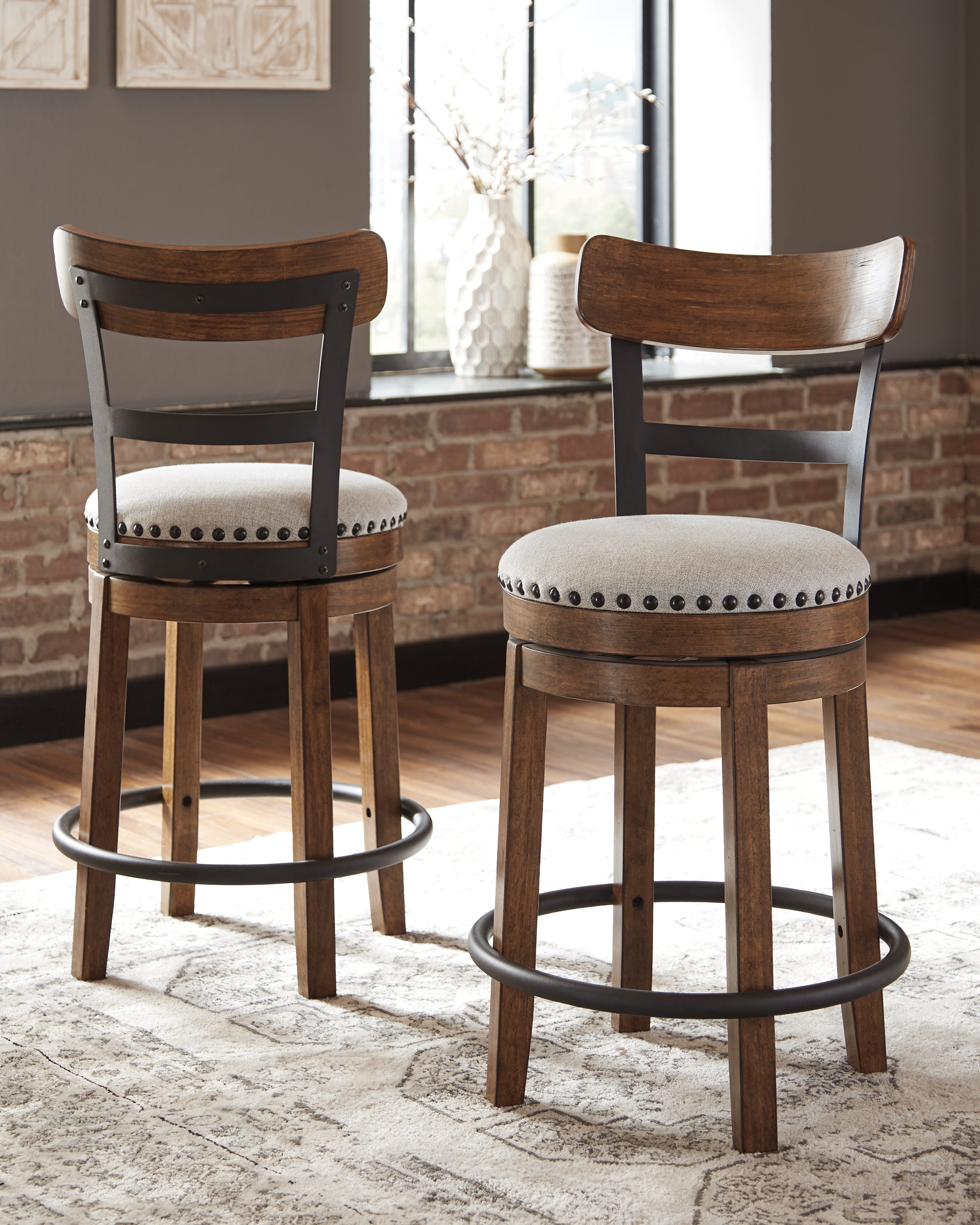A2Z Furniture - Ashley Furniture - Valebeck Dining Room - UPH Swivel Barstool (1/CN) / Brown - D546-424