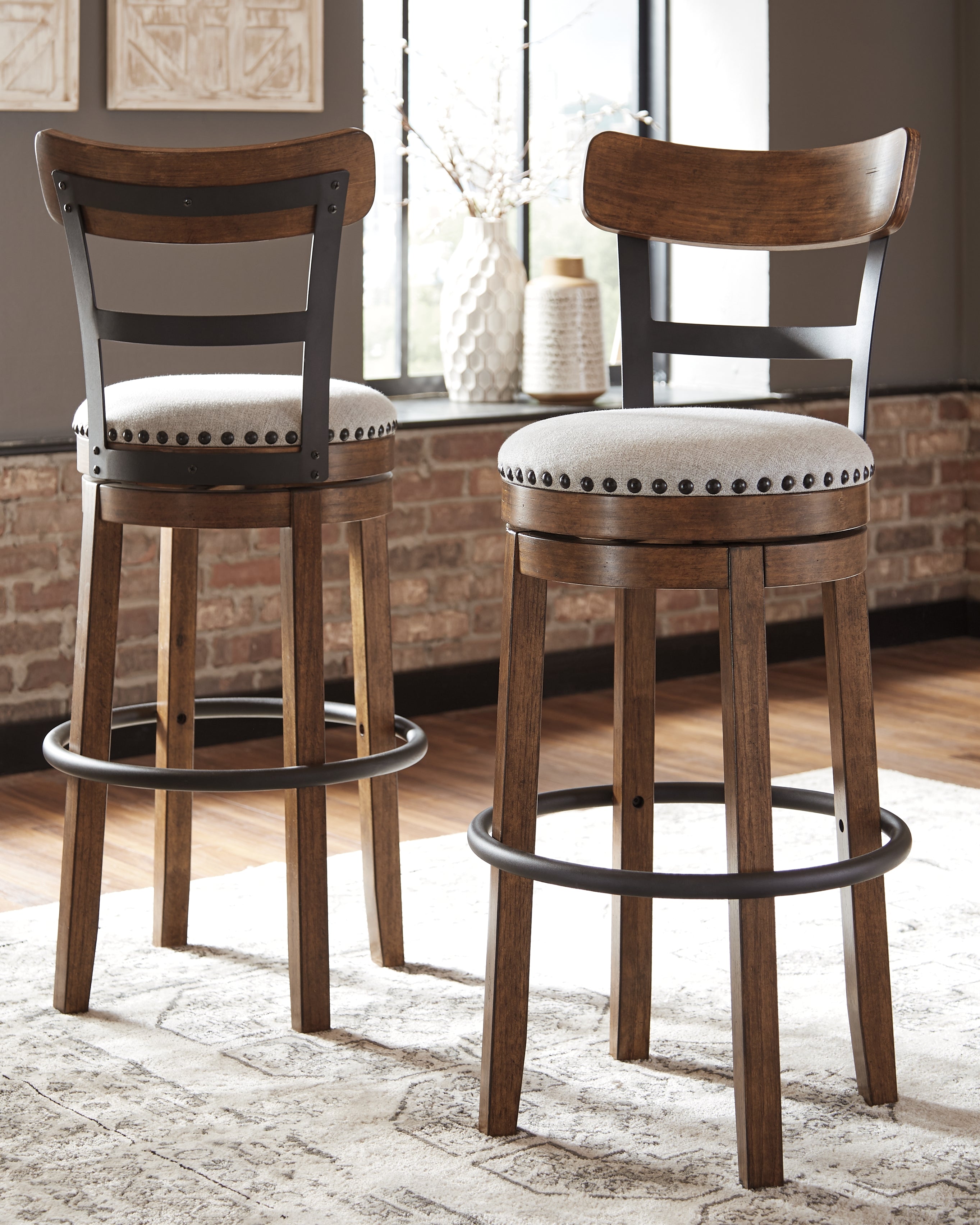 A2Z Furniture - Ashley Furniture - Valebeck Dining Room - Tall UPH Swivel Barstool(1/CN) / Brown - D546-430