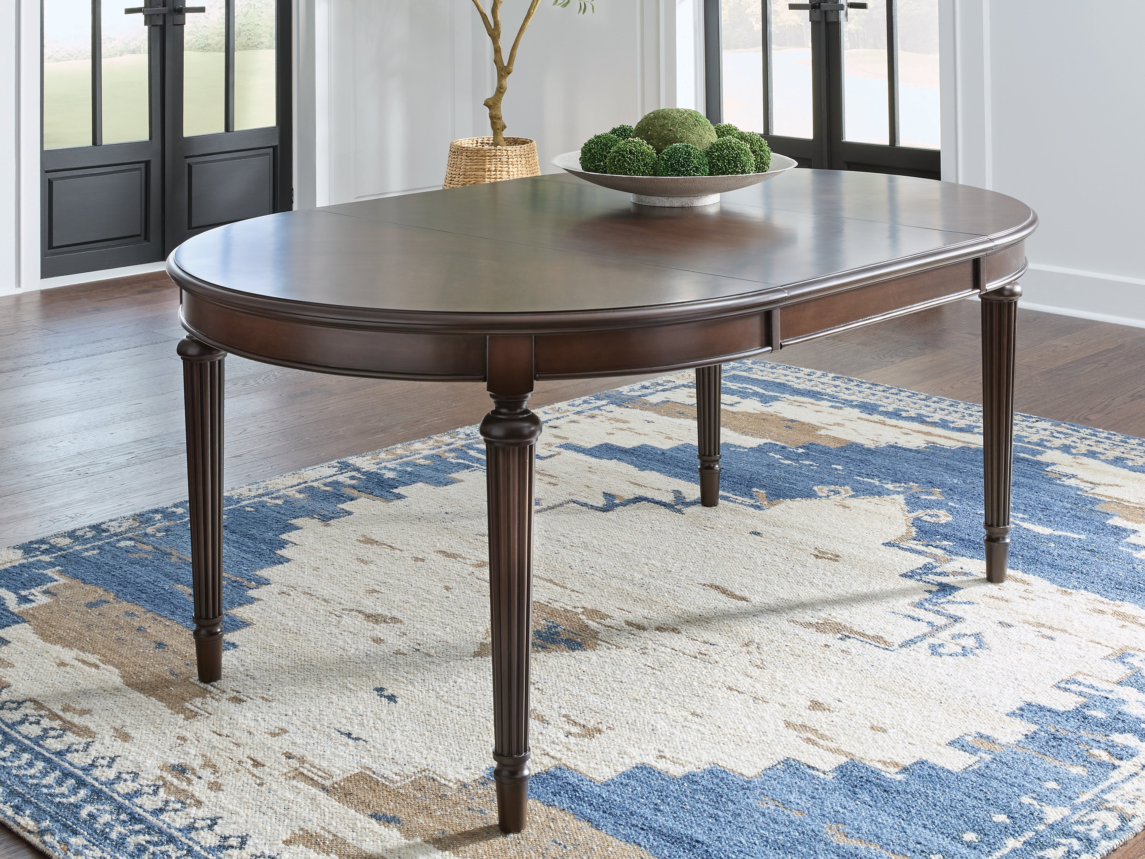 A2Z Furniture - Ashley Furniture - Lavinton Dining Room - Oval Dining Room EXT Table / Brown - D764-35