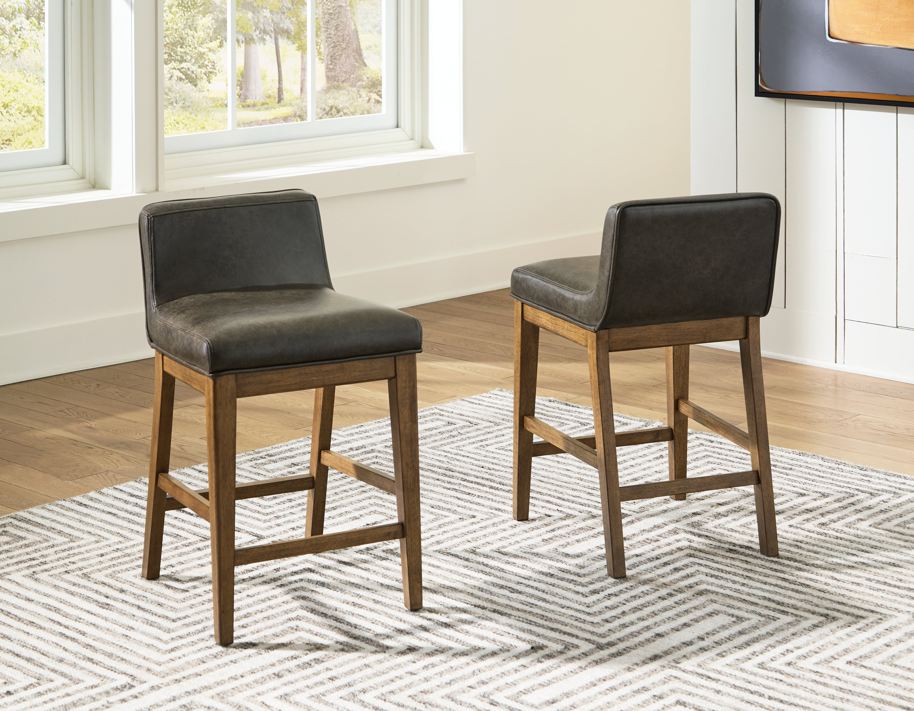 A2Z Furniture - Ashley Furniture - Cabalynn Dining Room - Counter Height Barstool (Set of 2) / Light Brown - D974-124X2