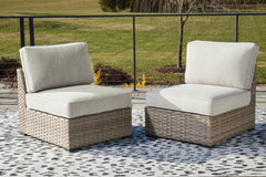 A2Z Furniture - Ashley Furniture - Calworth Outdoor - Armless Chair w/Cushion (Set of 2) / Beige - P458-846
