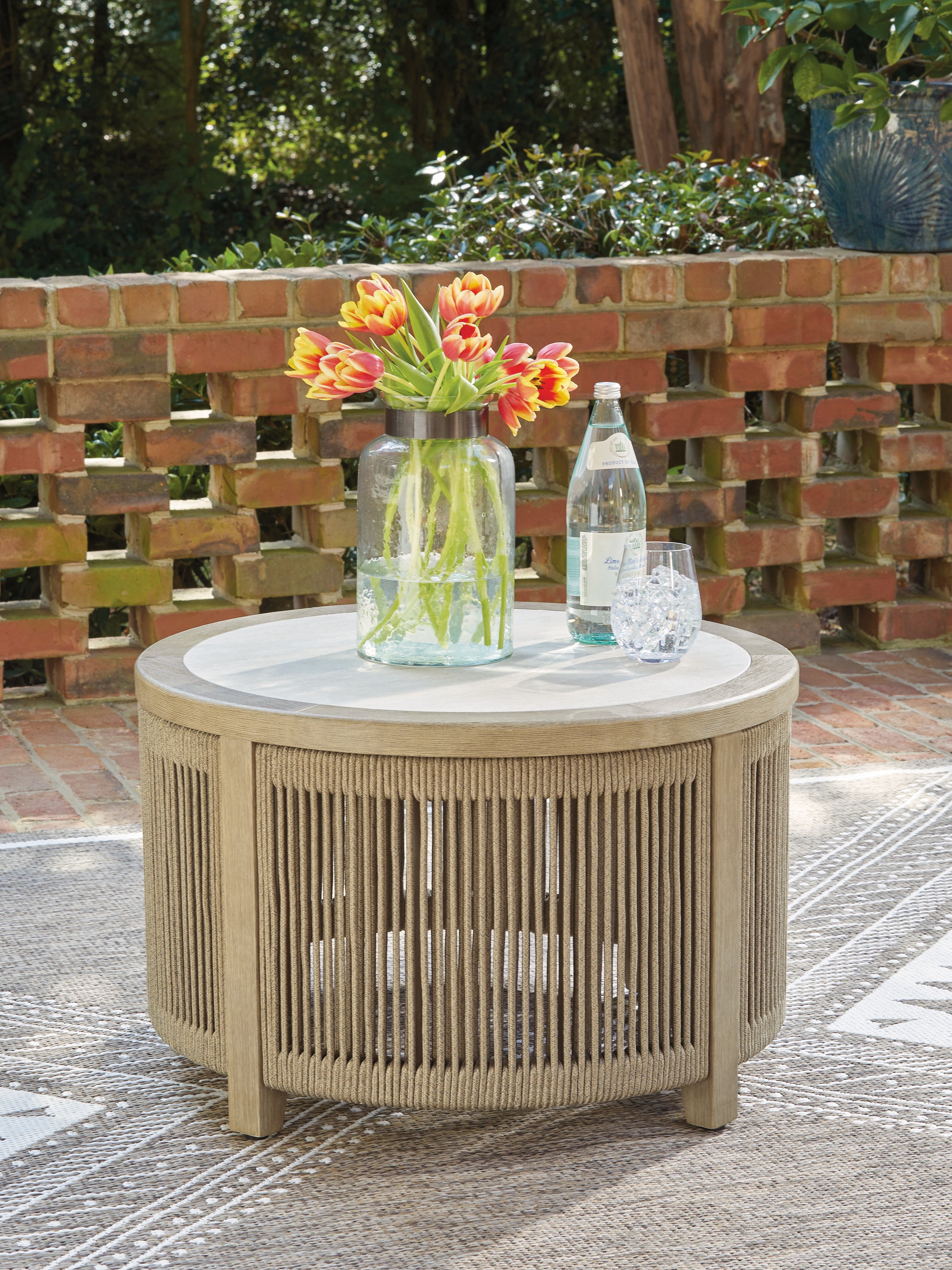A2Z Furniture - Ashley Furniture - Spooners Cove Outdoor - Round Cocktail Table / Beige - PCP469-708