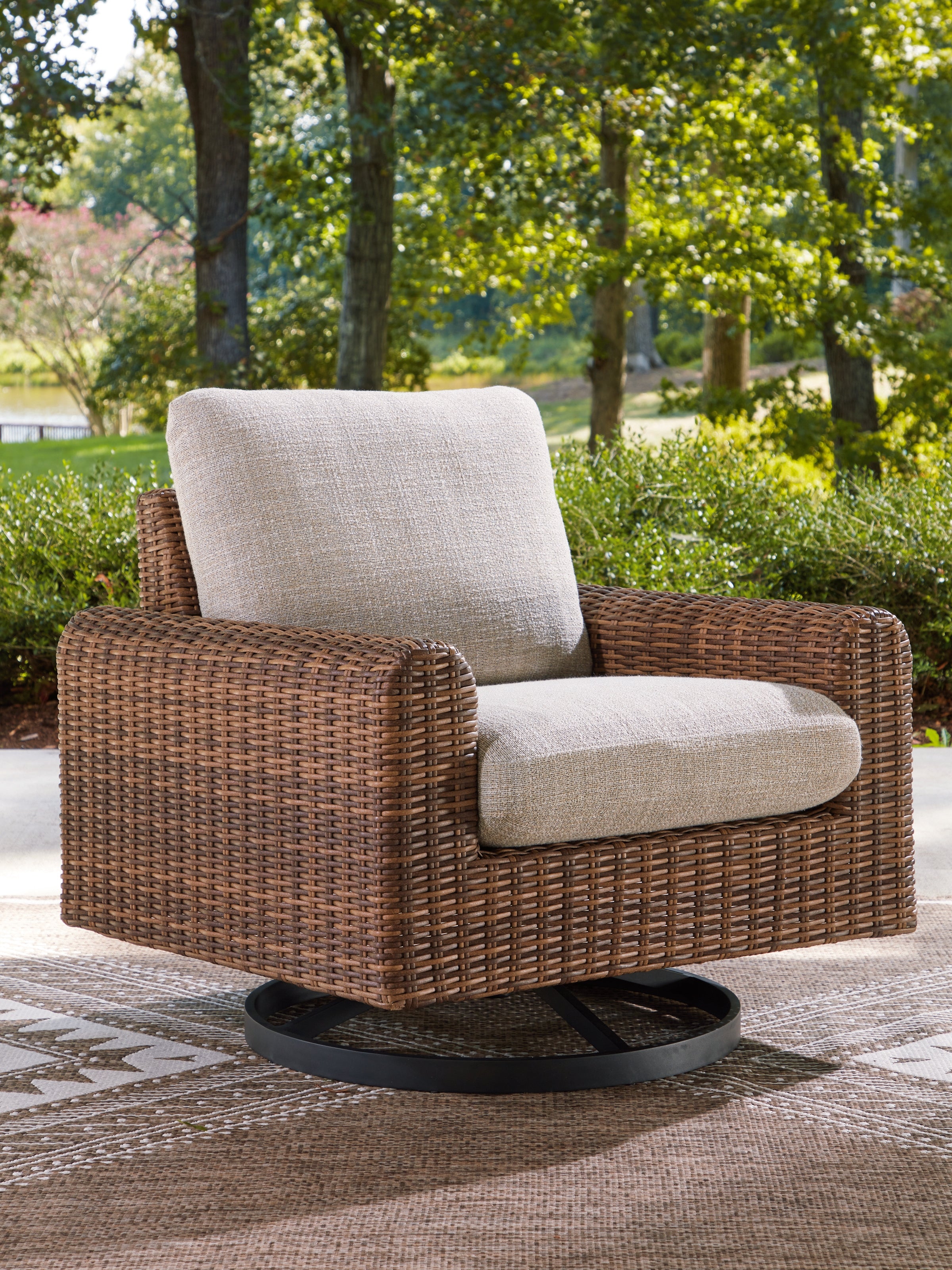 A2Z Furniture - Ashley Furniture - Dolan Creek Outdoor - Swivel Lounge w/ Cushion / Gray/Brown - PCP610-821