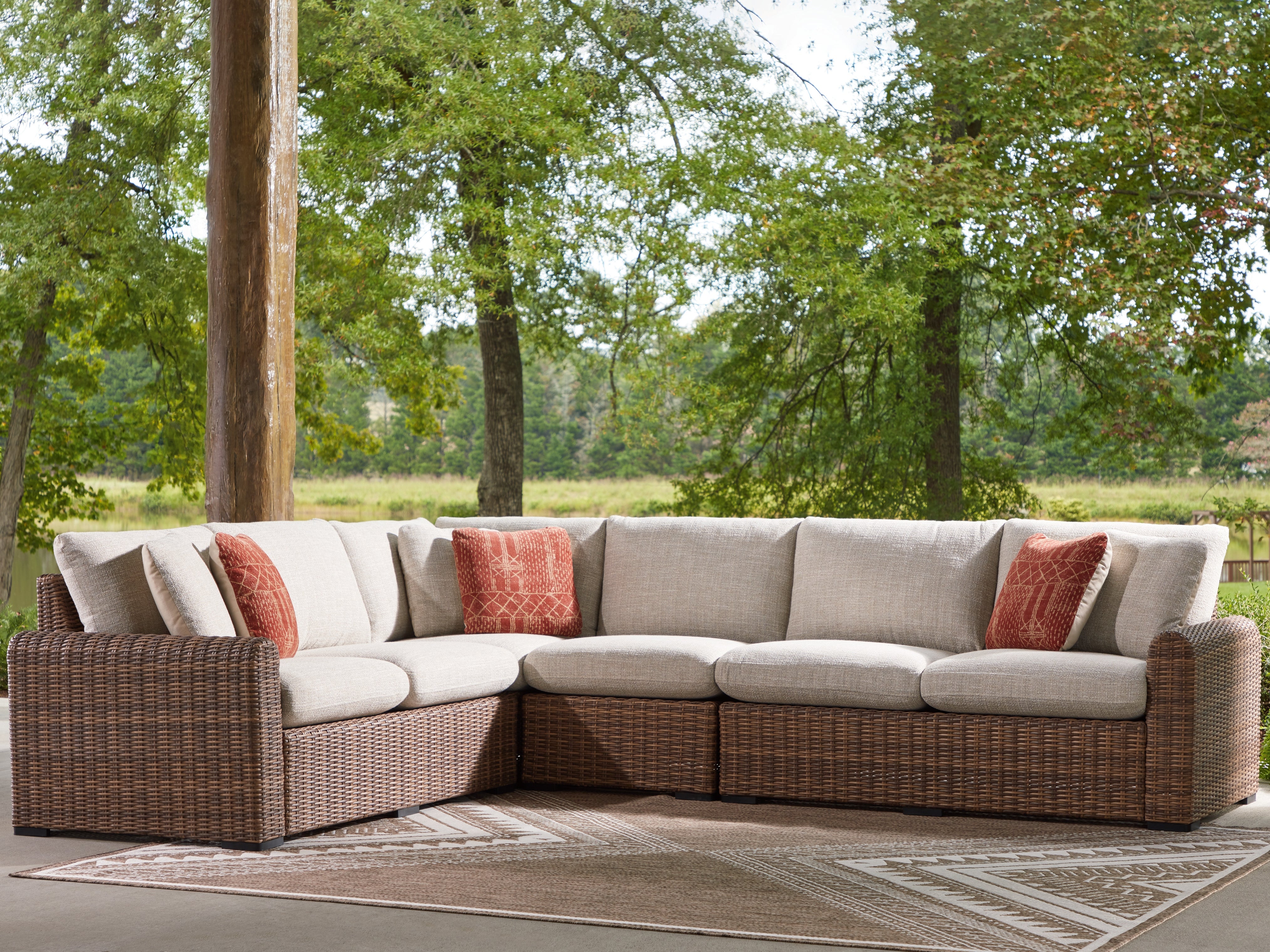 A2Z Furniture - Ashley Furniture - Dolan Creek Outdoor - 4-Piece Outdoor Sectional / Beige/Brown - PCP610P2
