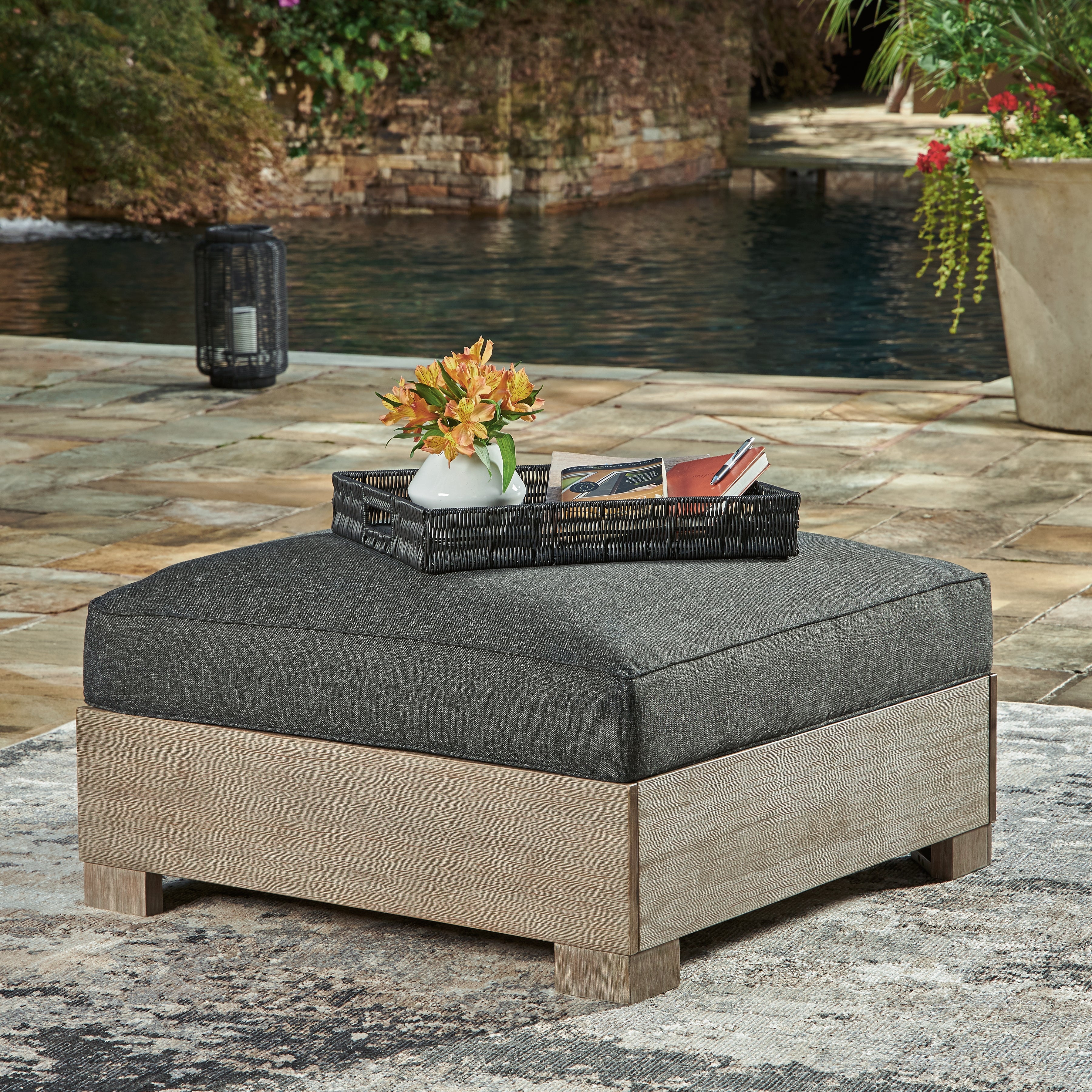 A2Z Furniture - Ashley Furniture - Citrine Park Outdoor - Ottoman with Cushion / Brown/Charcoal - P660-814