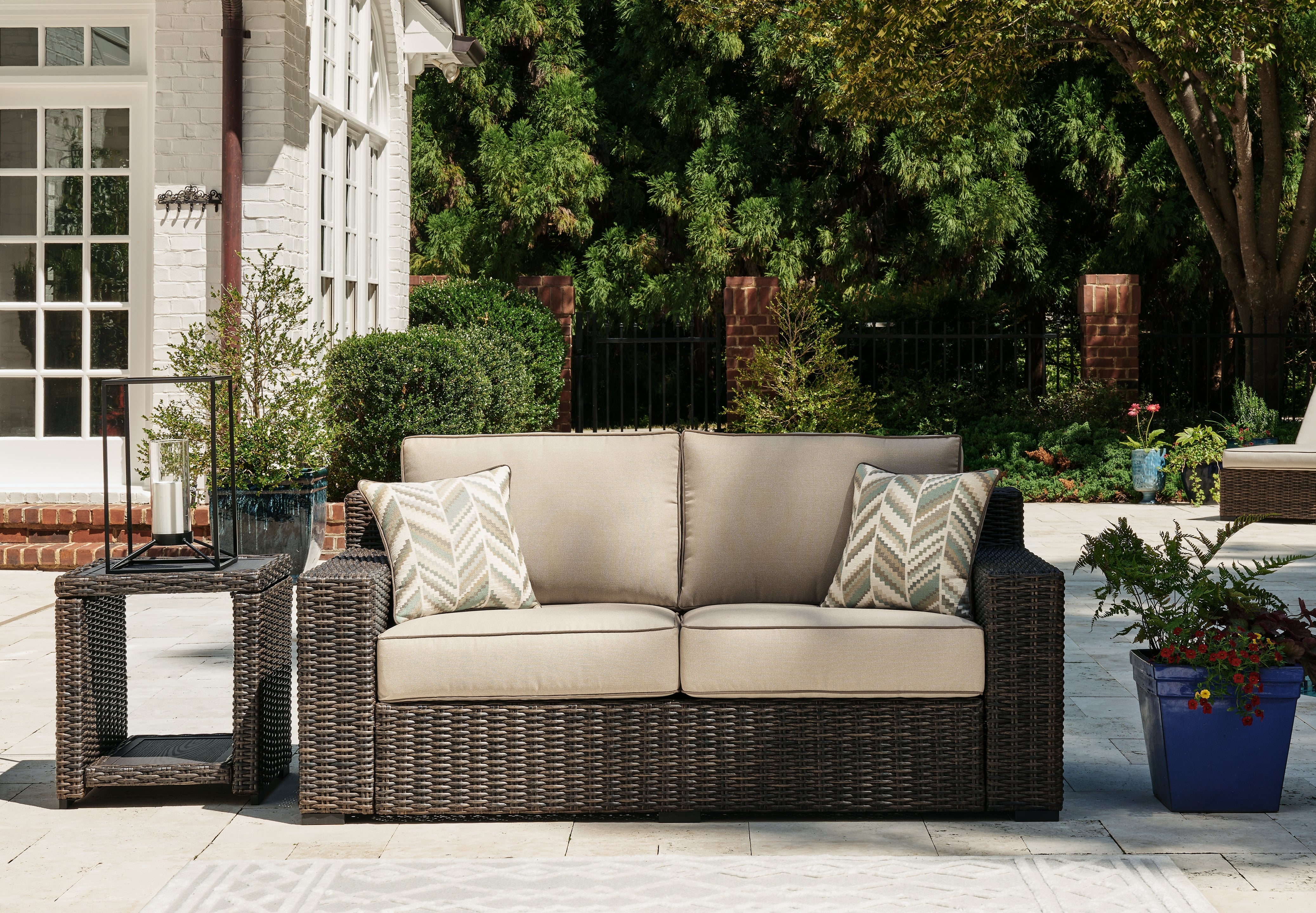 A2Z Furniture - Ashley Furniture - Coastline Bay Outdoor - Loveseat w/Cushion / Brown - P784-835