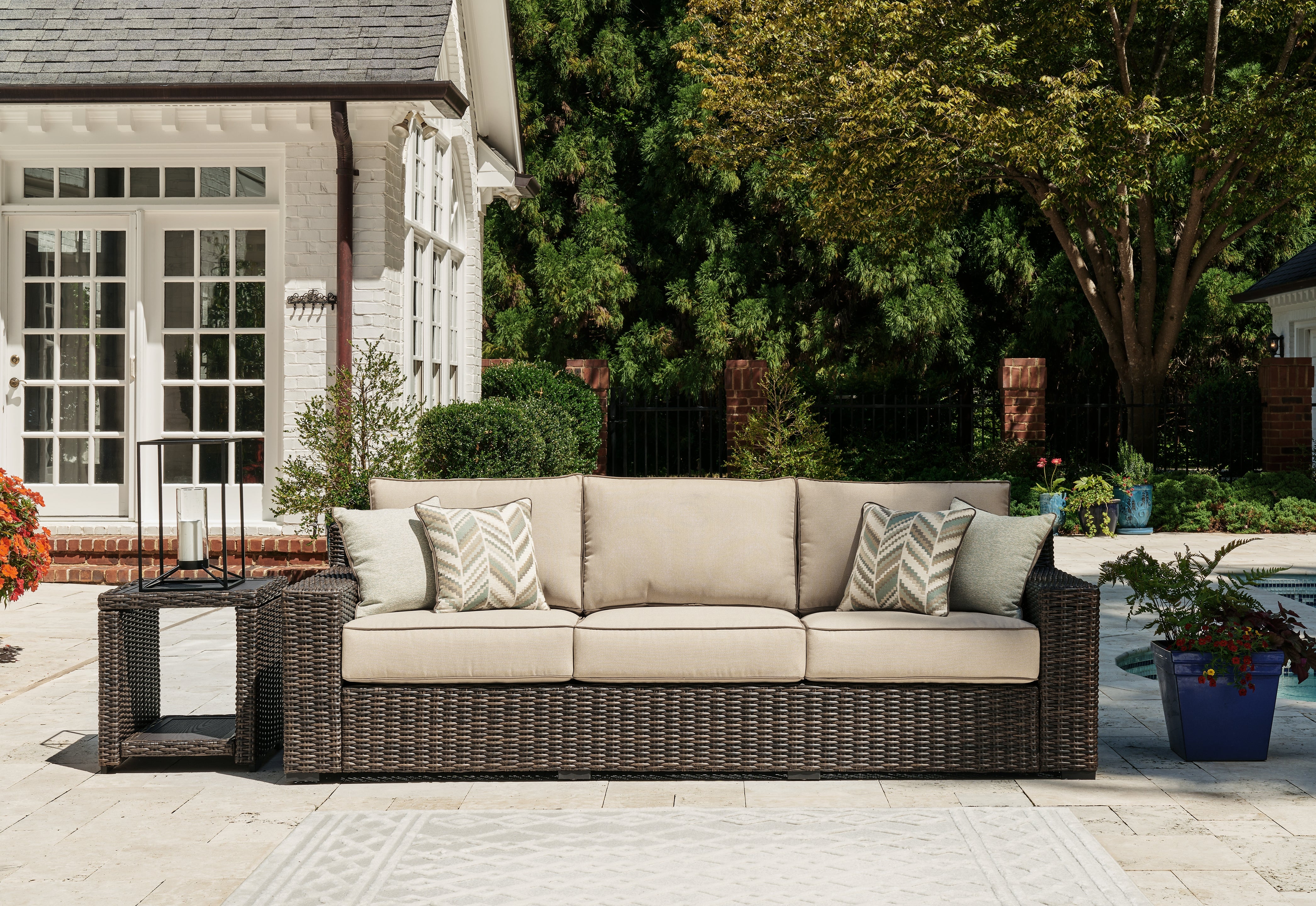 A2Z Furniture - Ashley Furniture - Coastline Bay Outdoor - Sofa with Cushion / Brown - P784-838