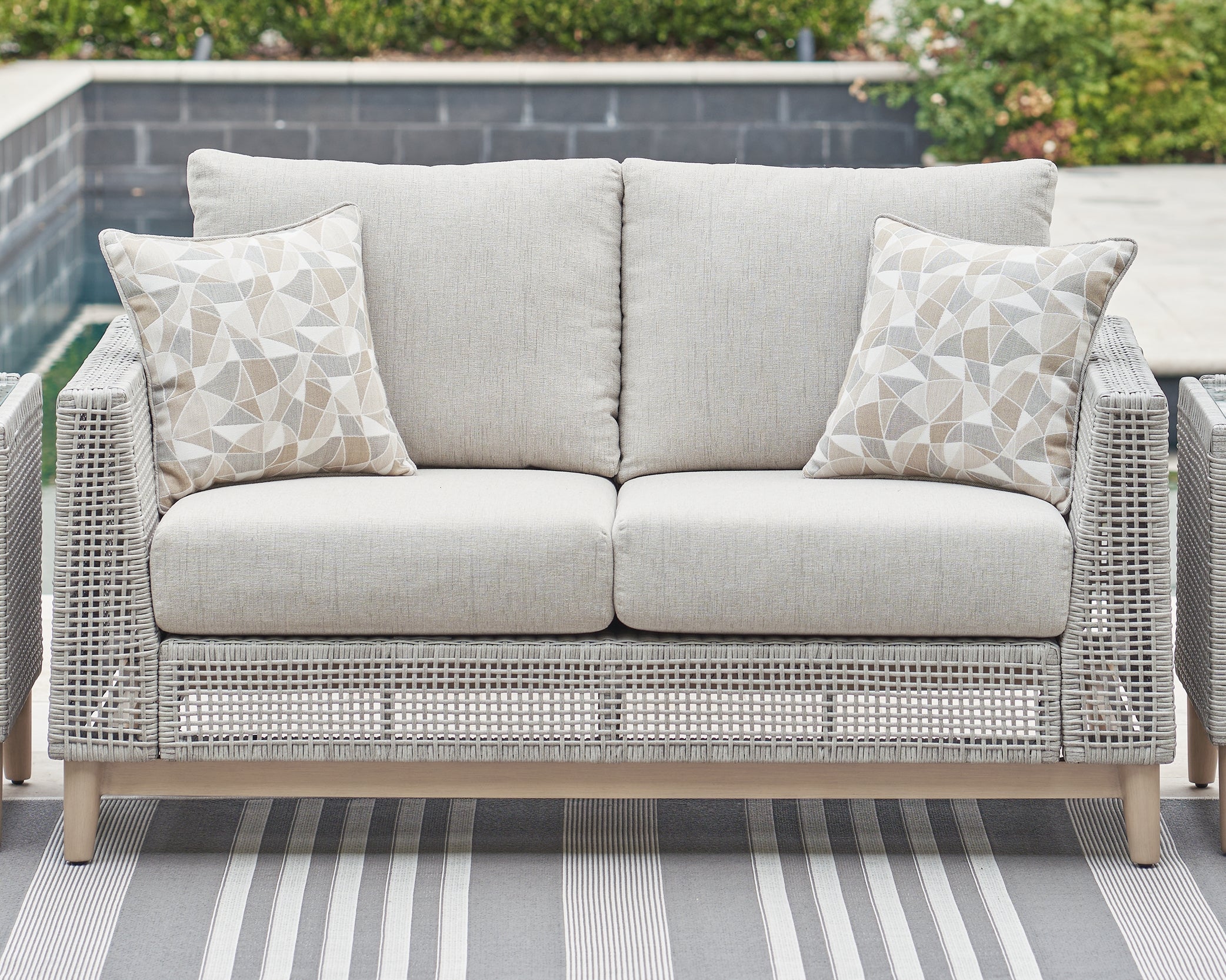 A2Z Furniture - Ashley Furniture - Seton Creek Outdoor - Loveseat w/Cushion / Gray - P798-835