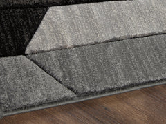 A2Z Furniture - Ashley Furniture - Chayse Rug - 5' x 6'7" Rug / Black/Gray - R403462