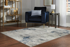 A2Z Furniture - Ashley Furniture - Wrenstow Rug - 5'3" x 7'3" Rug / Multi - R403752