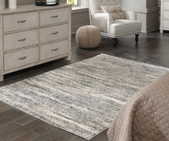 A2Z Furniture - Ashley Furniture - Gizela Rug - 5'3" x 7'3" Rug / Ivory/Beige/Gray - R404862