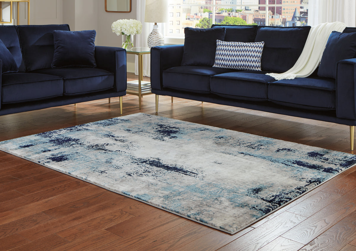 A2Z Furniture - Ashley Furniture - Leonelle Rug - 7'10" x 10' Rug / White/Blue/Gray - R404871
