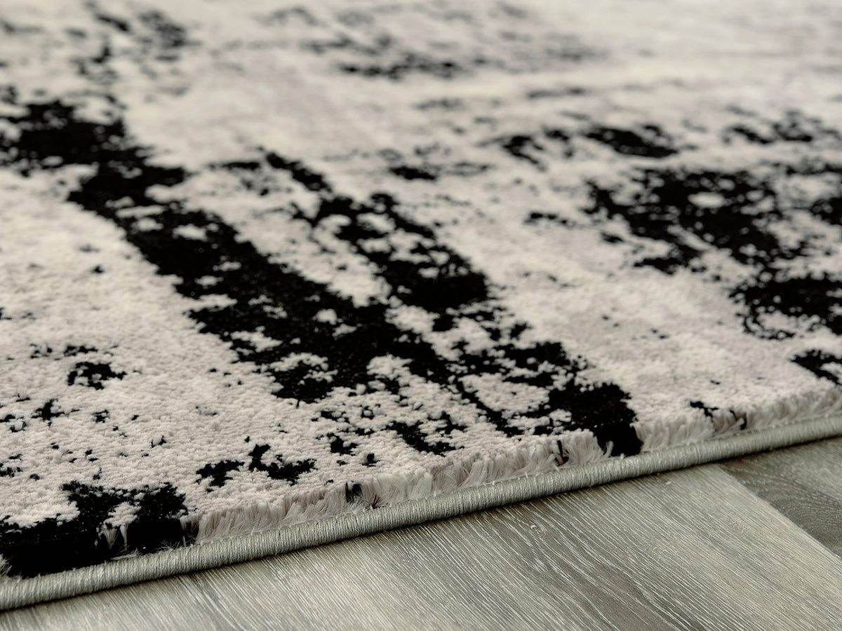 A2Z Furniture - Ashley Furniture - Zekeman Rug - 5'3" x 7'7" Rug / Black/Cream/Gray - R404922