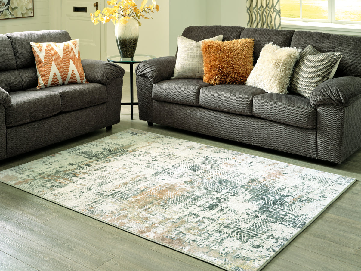 A2Z Furniture - Ashley Furniture - Redlings Rug - 5' x 7' Rug / Multi - R405452