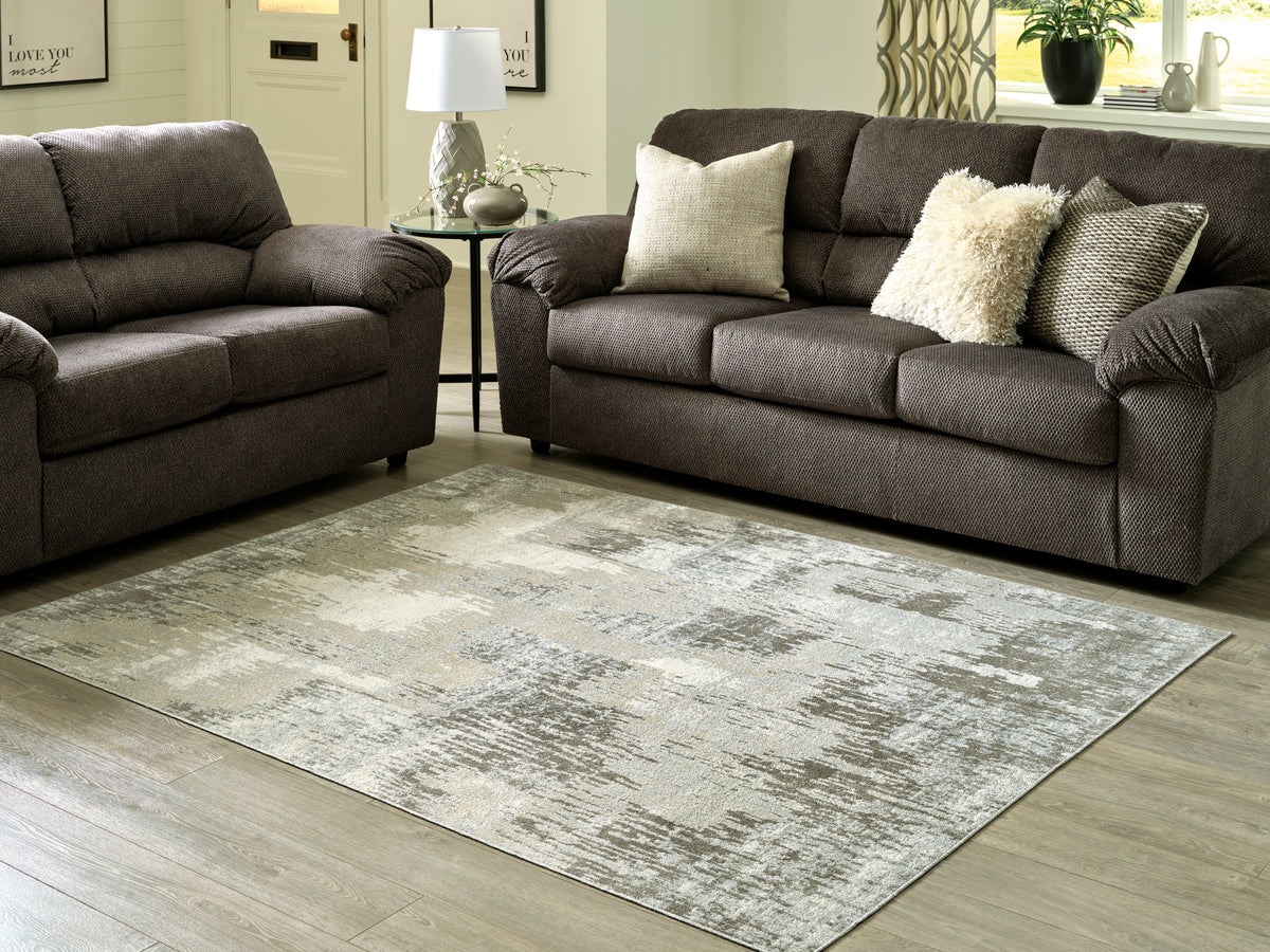 A2Z Furniture - Ashley Furniture - Arriston Rug - 7'10" x 10' Washable Rug / Multi - R405561
