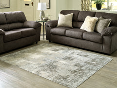 A2Z Furniture - Ashley Furniture - Arriston Rug - 7'10" x 10' Washable Rug / Multi - R405561