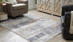 A2Z Furniture - Ashley Furniture - Rhettner Rug - 5'3" x 7'3" Rug / Multi - R406072