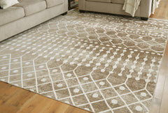 A2Z Furniture - Ashley Furniture - Bunchly Rug - 7'10" x 10'3" Washable Rug / Tan/Brown/Cream - R406221