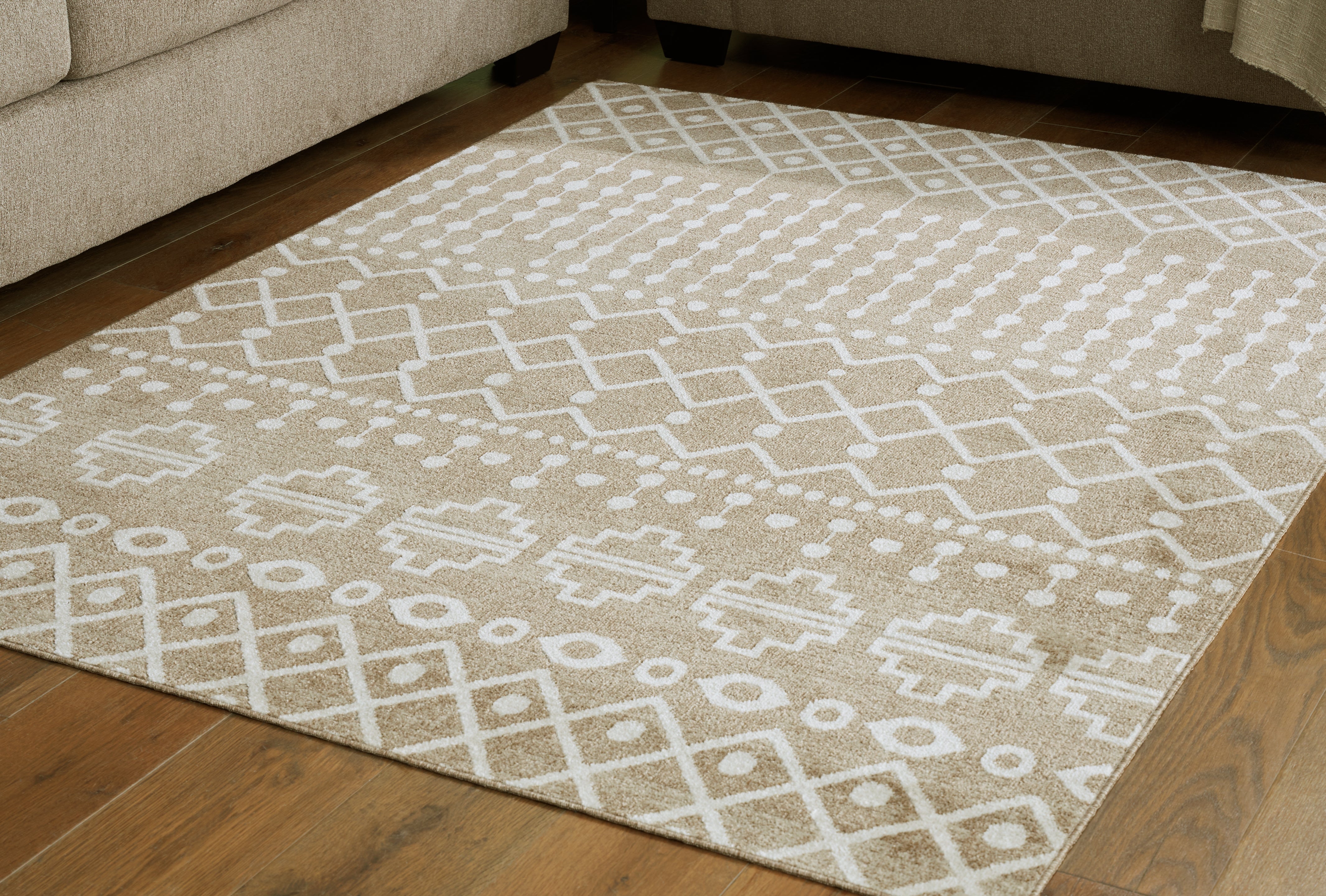 A2Z Furniture - Ashley Furniture - Bunchly Rug - 4'11" x 7'2" Washable Rug / Tan/Brown/Cream - R406222