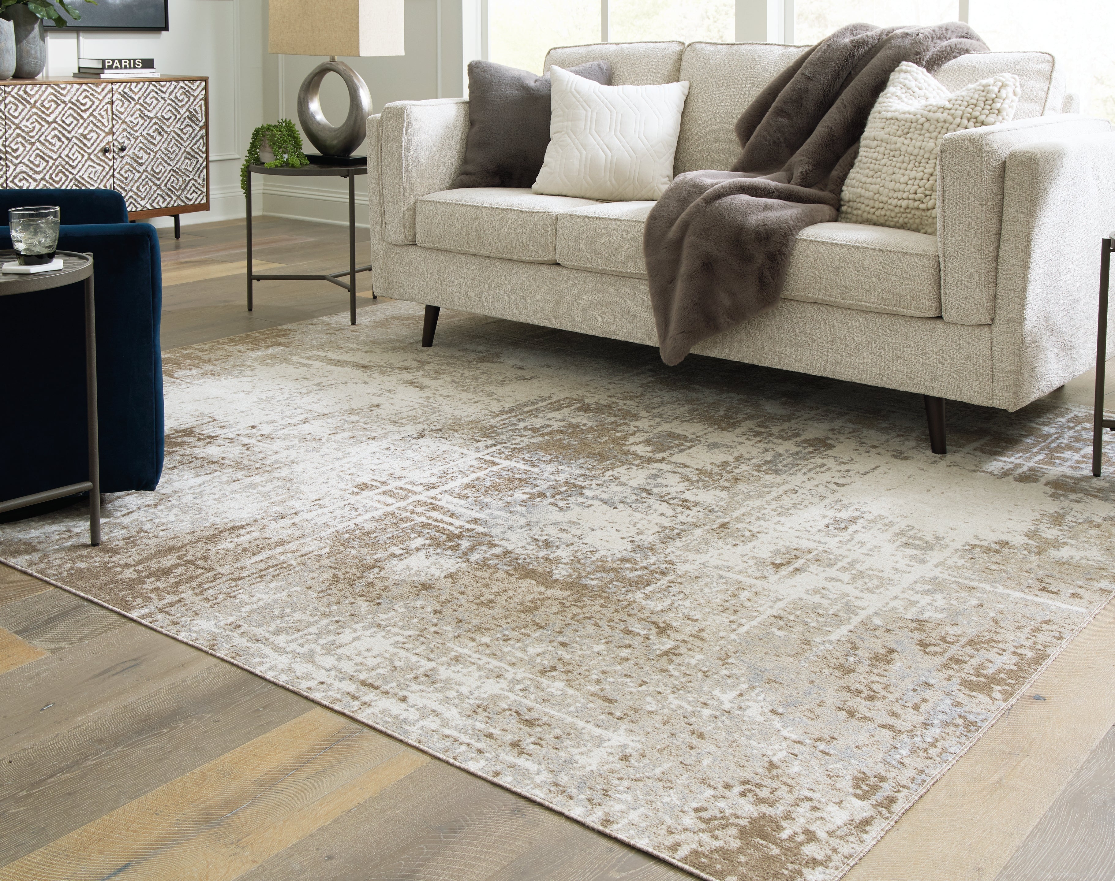 A2Z Furniture - Ashley Furniture - Grifflain Rug - 7'10" x 10'3" Washable Rug / Tan/Brown/Gray - R406231