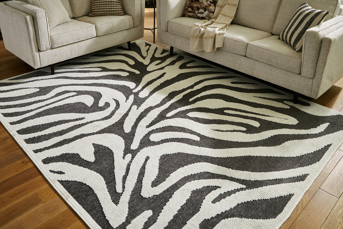 A2Z Furniture - Ashley Furniture - Thomwith Rug - 8' x 10'2" Washable Rug / Black/Ivory - R406291
