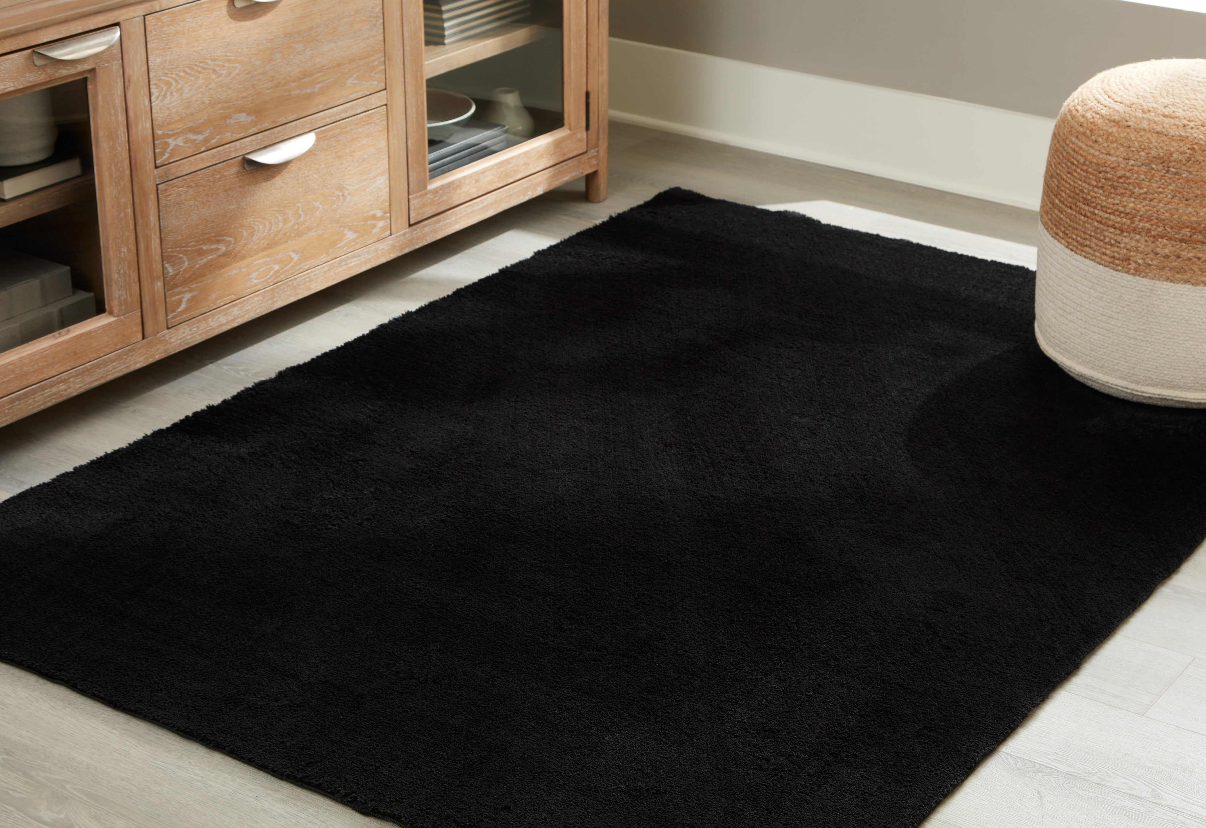A2Z Furniture - Ashley Furniture - Anaben Rug - 8' x 10'1" Washable Rug / Black - R406311