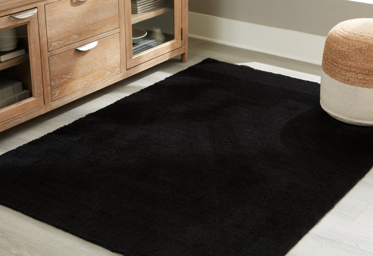 A2Z Furniture - Ashley Furniture - Anaben Rug - 8' x 10'1" Washable Rug / Black - R406311