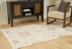 A2Z Furniture - Ashley Furniture - Calkin Rug - 8' x 10' Rug / Linen/Gray/Caramel - R406391