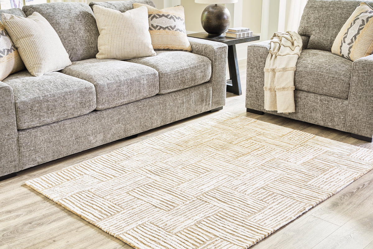 A2Z Furniture - Ashley Furniture - Adanmund Rug - 5' x 7' Rug / Beige/Caramel - R406412