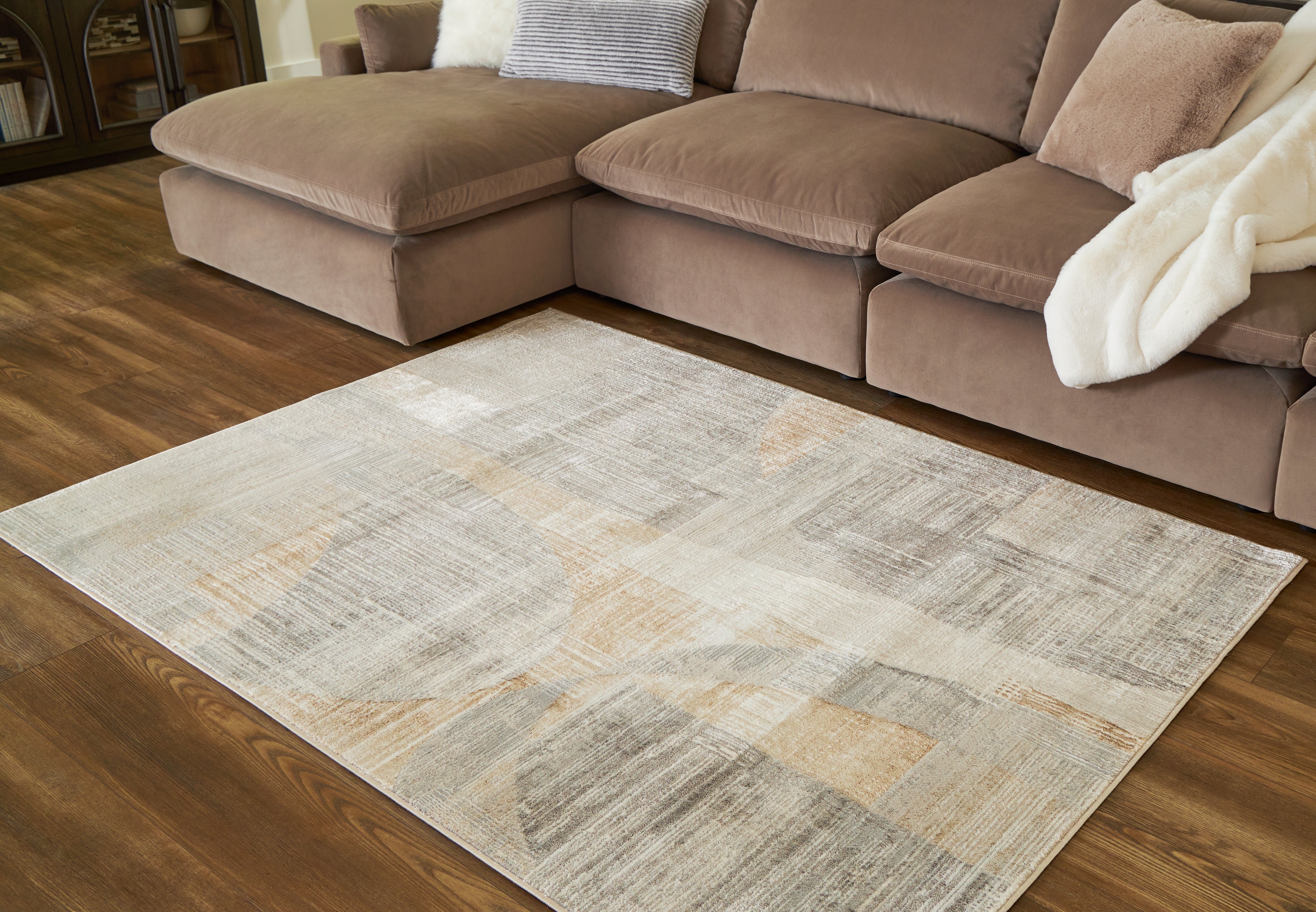 A2Z Furniture - Ashley Furniture - Truward Rug - 5' x 7' Rug / Linen/Gray/Caramel - R406472