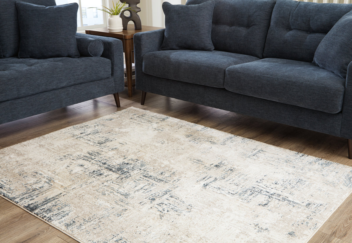 A2Z Furniture - Ashley Furniture - Gentor Rug - 5' x 7' Rug / Blue/Ivory - R406522